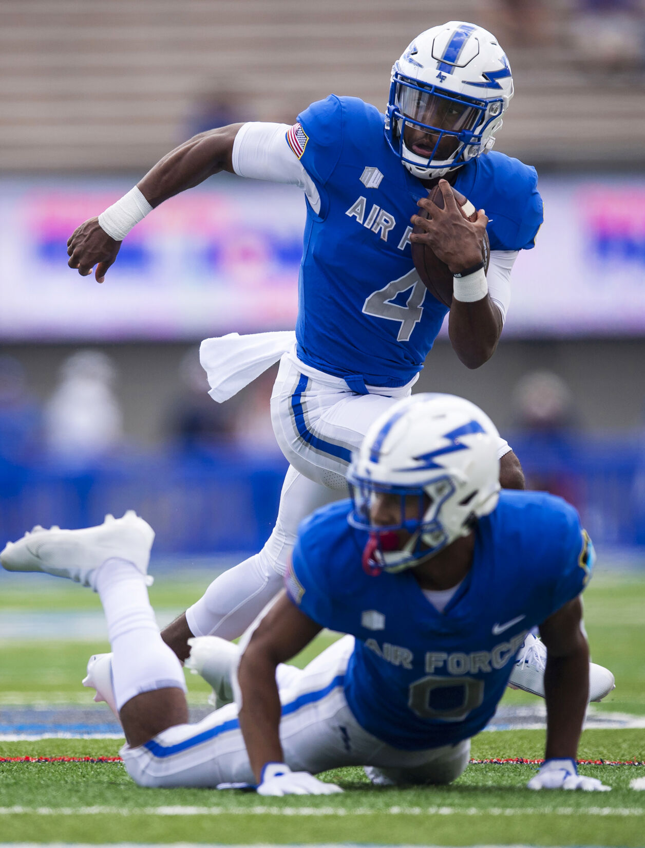 Air Force quarterback Haaziq Daniels (4) carries the ball during the Air Force Falcons home football game against the Lafayette Leopards at Falcon Stadium at the United States Air Force Academy in Colorado Springs, Colo. on Sept. 4, 2021. The Air Force Falcons won the game against the Lafayette Leopards by a score of 35-14. (Chancey Bush/ The Gazette) (Chancey Bush/ The Gazette)