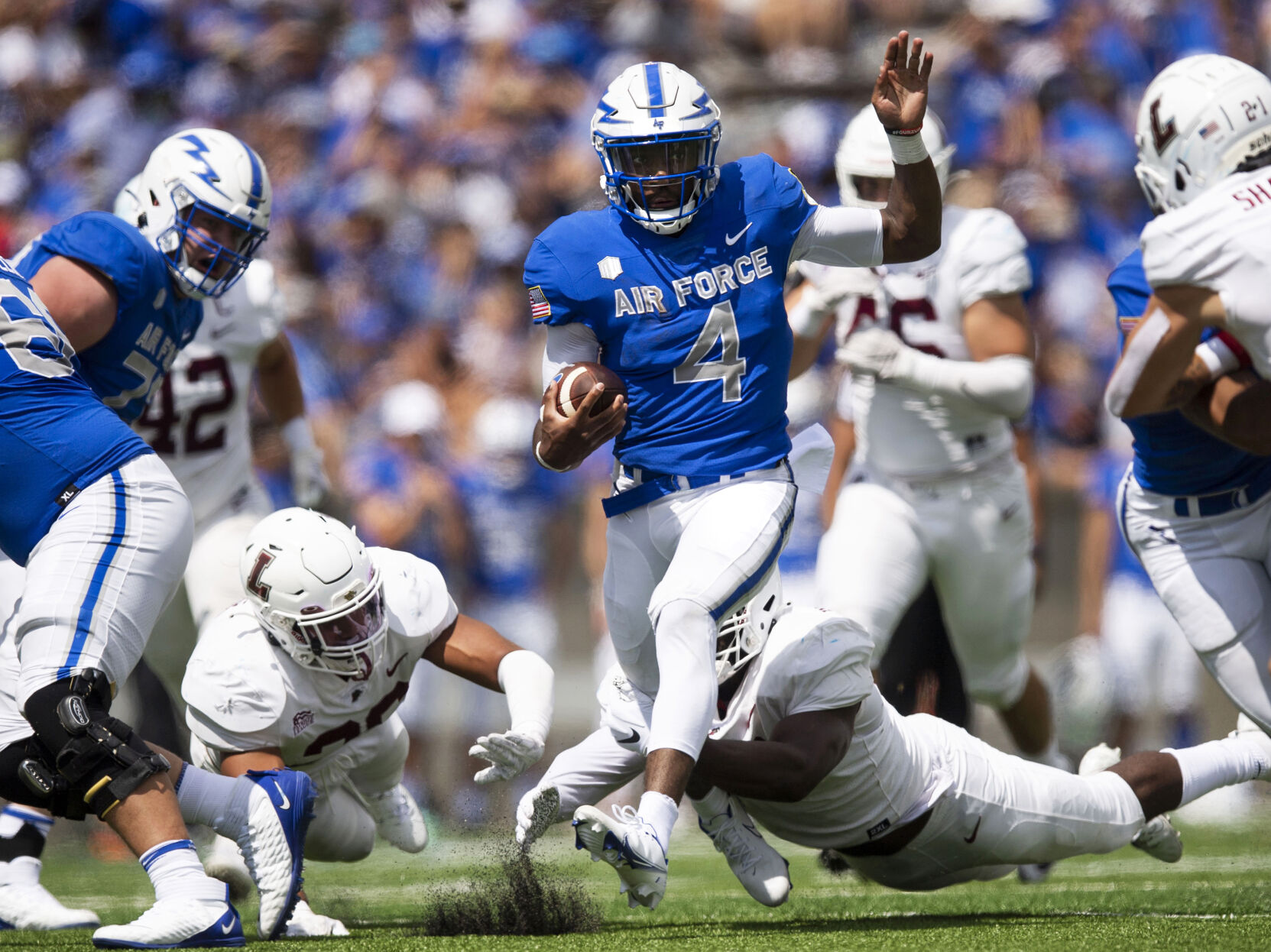 Air Force quarterback Haaziq Daniels carries the ball Sept. 4 against Lafayette at Falcon Stadium in Colorado Springs. (Chancey Bush/ The Gazette)