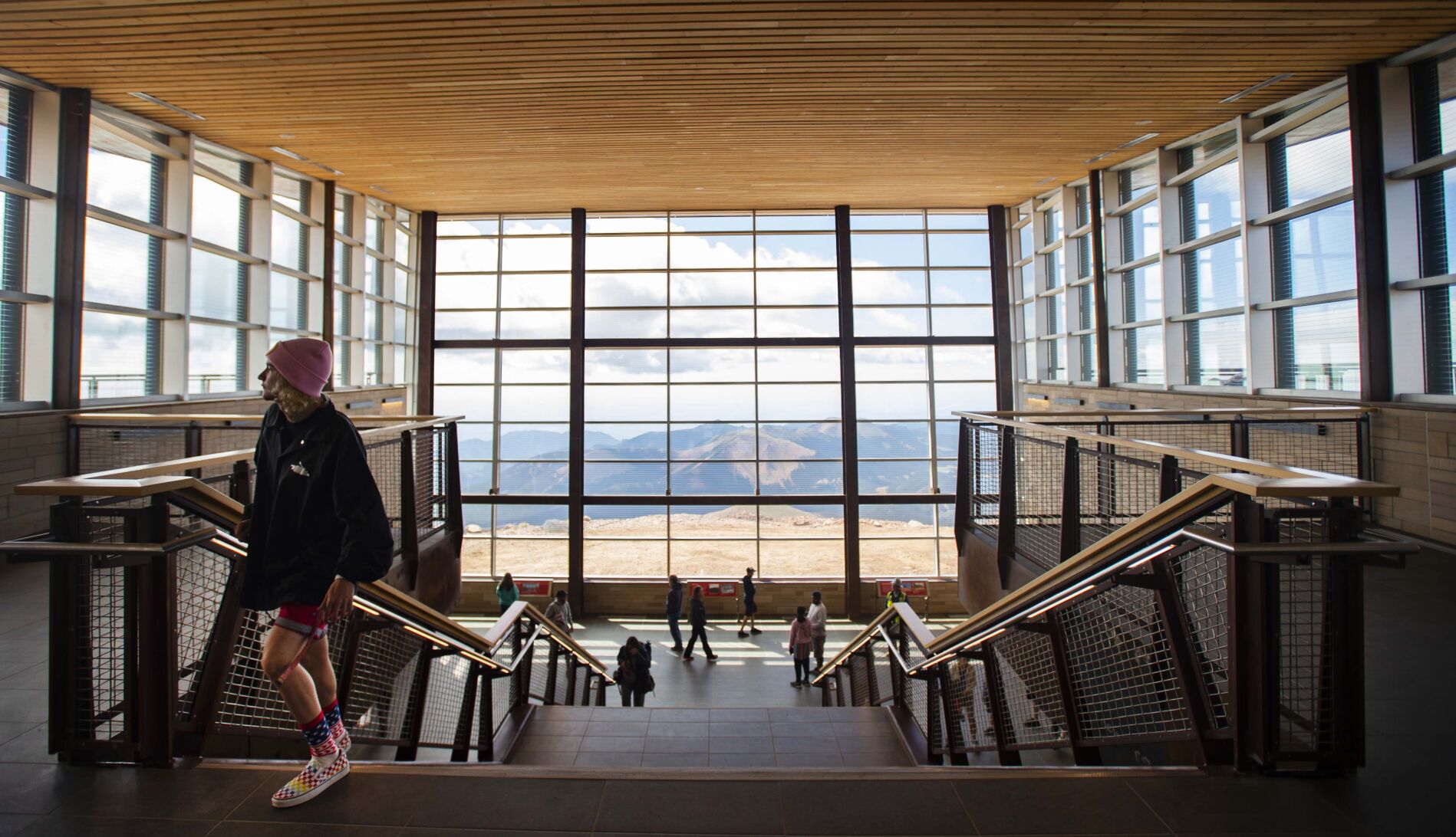 Visitors explore the new Pikes Peak Summit Visitor Center on top of the 14,115-foot mountain inJuneon the opening day of the 38,000-square-foot complex. Crews are still working on some detail work, landscaping and the new parking lot. The $65 million project took three years. The summit has limited parking for disabled parking permitted vehicles and families with children in car seats. Other visitors will be shuttled from Devil’s Playground on school buses until the parking lot is finished. A ribbon-cutting ceremony was held June 30. (photos by Christian Murdock, The Gazette)