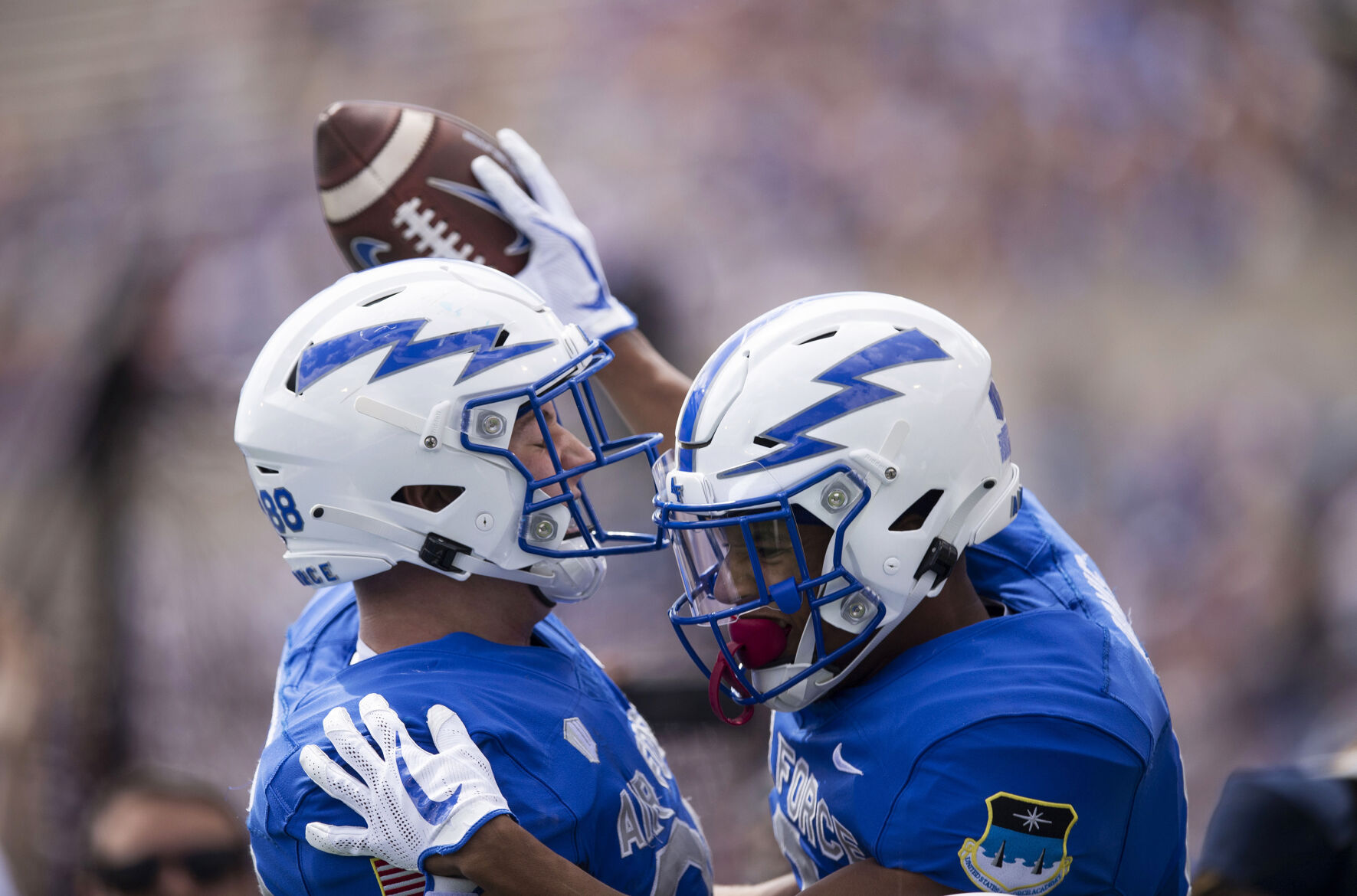 Air Force tight end Kyle Patterson, left, celebrates with wide receiver Micah Davis after Davis scored a touchdown Sept. 4, 2021 against Lafay (The Gazette file)