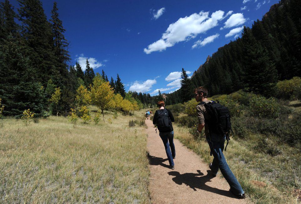 Hikers hike the trail to the Crags from the Crags Campground Sept. 4, 2012. (The Gazette, Christian Murdock) (Christian murdock)