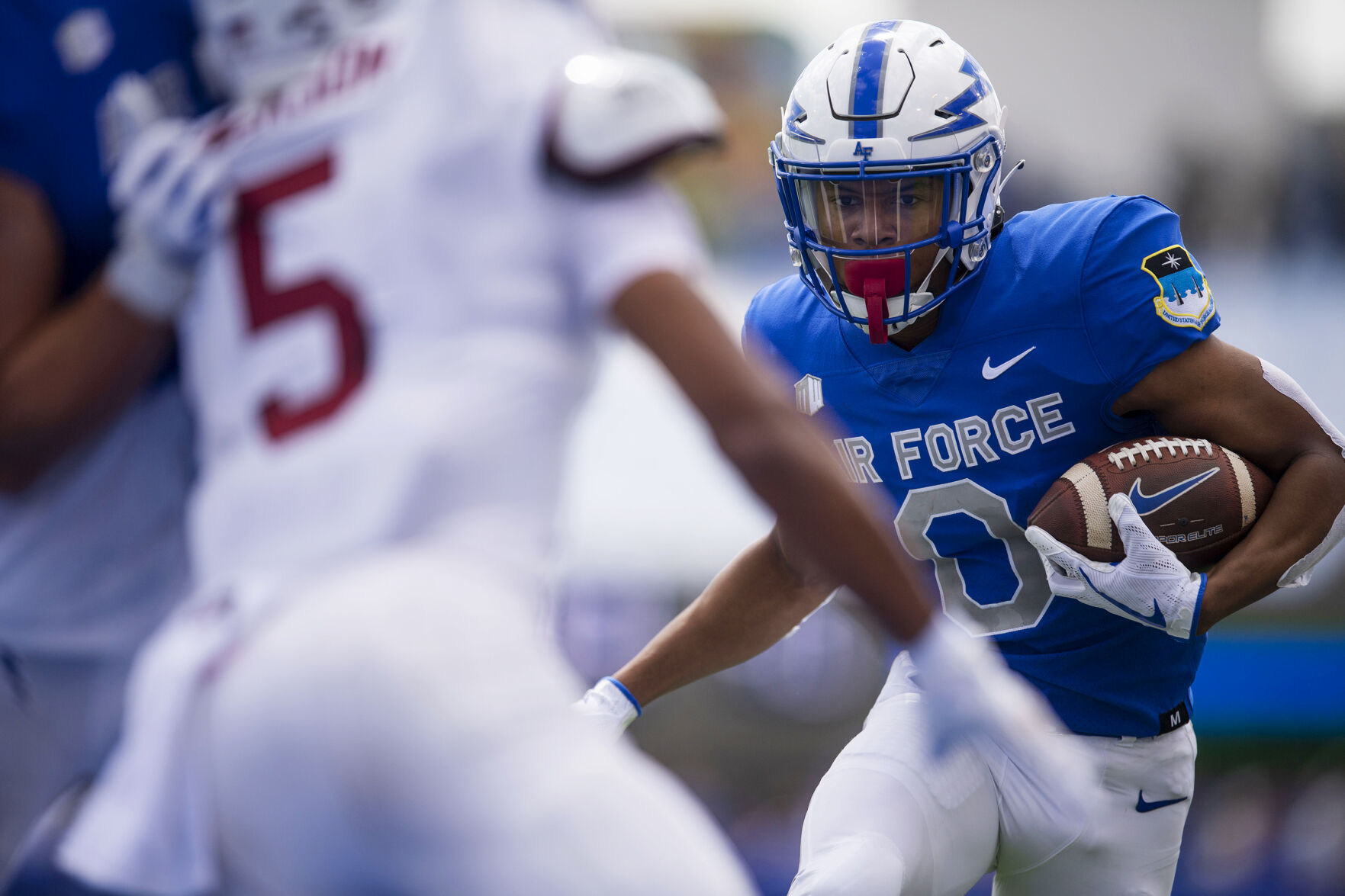 Air Force wide receiver Micah Davis (0) carries the ball in for a touch down against the Lafayette Leopards at Falcon Stadium at the United States Air Force Academy in Colorado Springs, Colo. on Sept. 4, 2021. The Air Force Falcons won the game against the Lafayette Leopards by a score of 35-14. (Chancey Bush/ The Gazette) (Chancey Bush/ The Gazette)