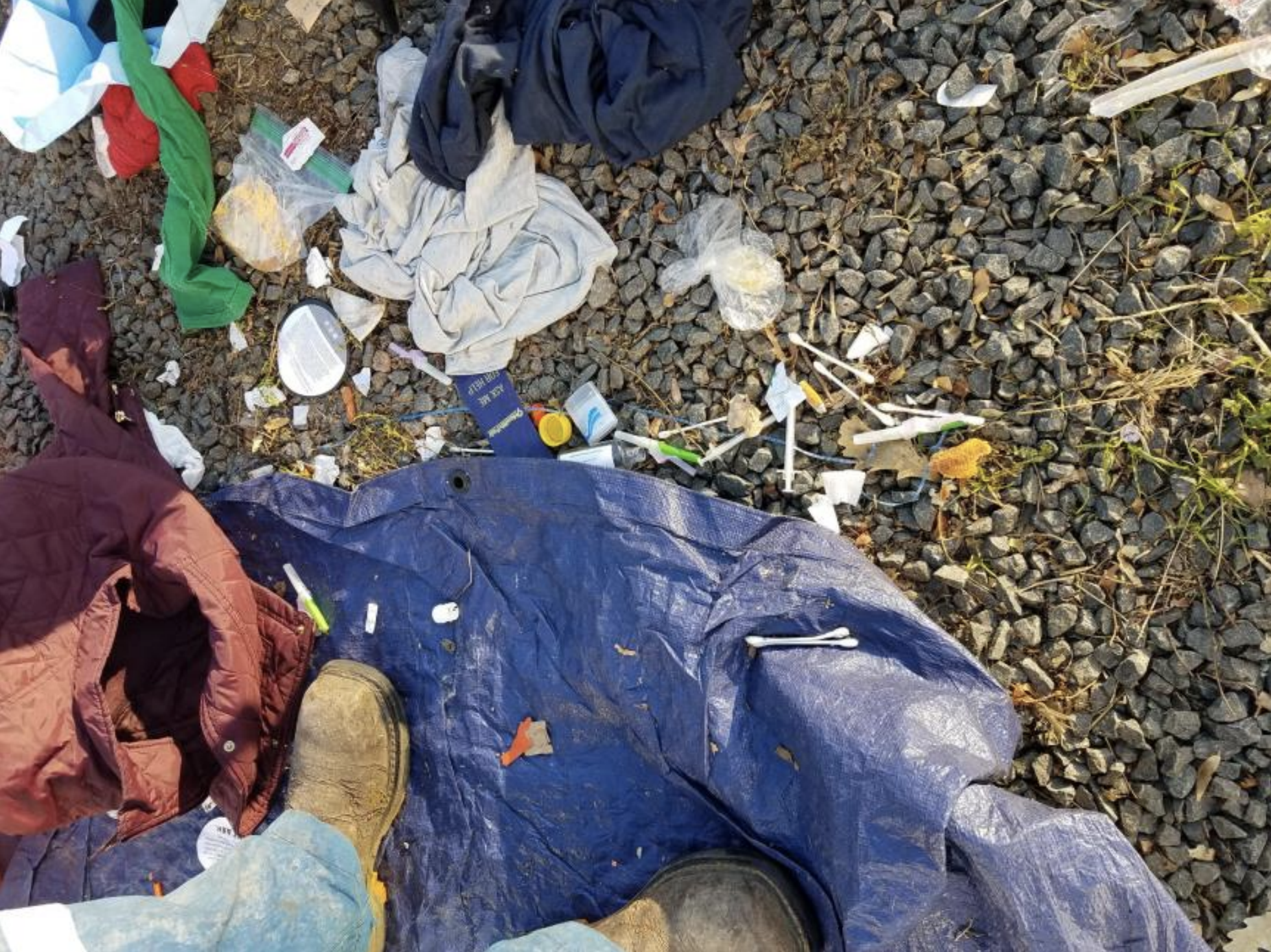 Syringes and drug paraphernalia found during the cleaning of an illegal homeless camp in Denver. (Photo courtesy of the Denver Department of Public Health and Environment)