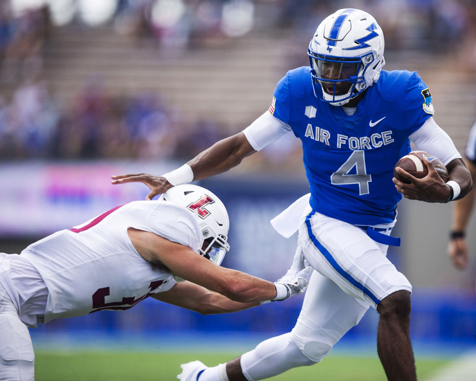 Air Force quarterback Haaziq Daniels (4) carries the ball during the Air Force Falcons home football game against the Lafayette Leopards at Falcon Stadium at the United States Air Force Academy in Colorado Springs, Colo. on Sept. 4, 2021. The Air Force Falcons won the game against the Lafayette Leopards by a score of 35-14. (Chancey Bush/ The Gazette) (Chancey Bush/ The Gazette)