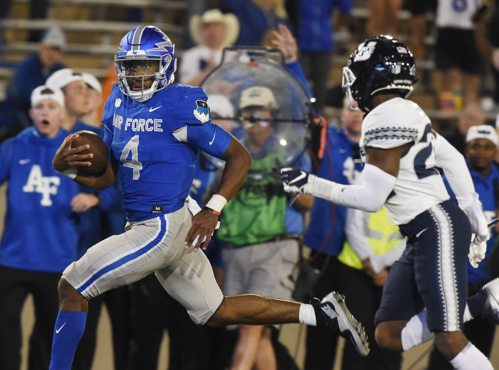 Air Force quarterback Haaziq Daniels runs for a touchdown in the fourth quarter of a game at Falcon Stadium in Colorado Springs, Colorado on Saturday, Sept. 18, 2021 He threw an interception in the end zone on the next play. Air Force lost the heartbreaker 49-45. (Photo by Jerilee Bennett, The Gazette) (JERILEE BENNETT, THE GAZETTE)