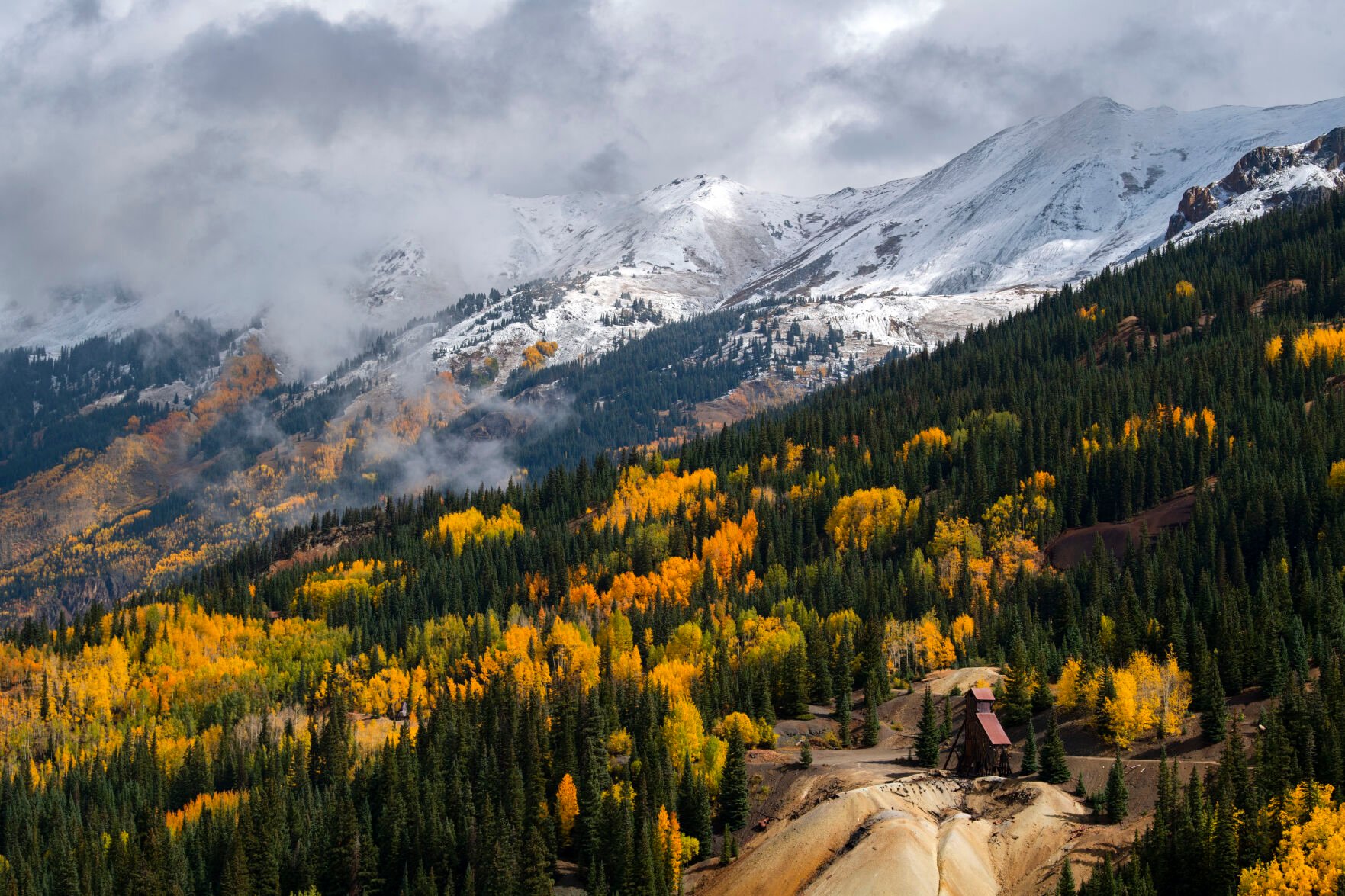 The clouds begin to break on Red Mountain Pass between Silverton and Ouray, Colo., Wednesday, Sept. 29, 2021, after the storm passed through the San Juan Mountains bringing the area rain and snow. (The Gazette, Christian Murdock) (Christian Murdock/The Gazette)