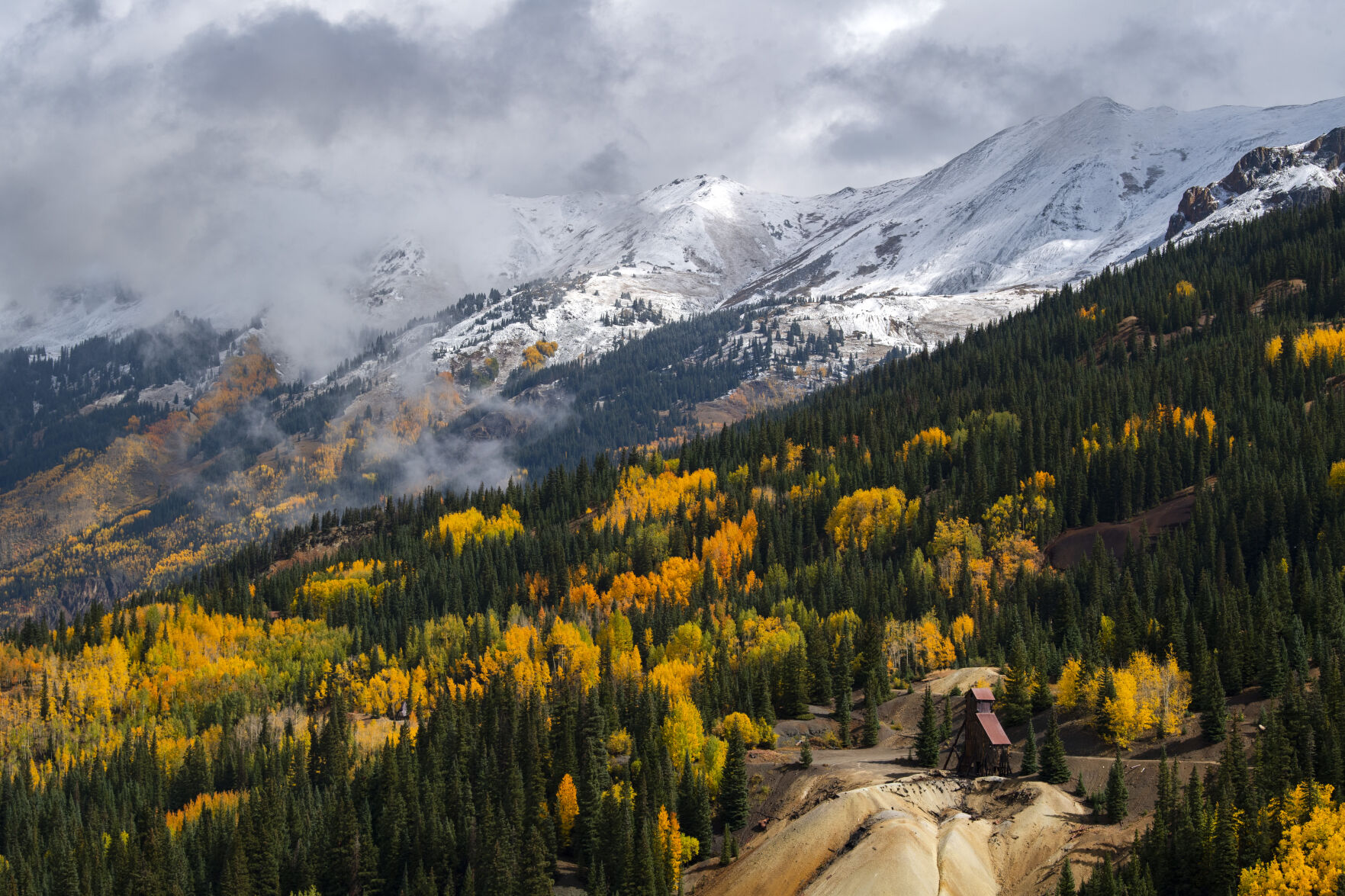 The clouds begin to break on Red Mountain Pass between Silverton and Ouray, Colo., Wednesday, Sept. 29, 2021, after the storm passed through the San Juan Mountains bringing the area rain and snow. (The Gazette, Christian Murdock) (Christian Murdock/The Gazette)