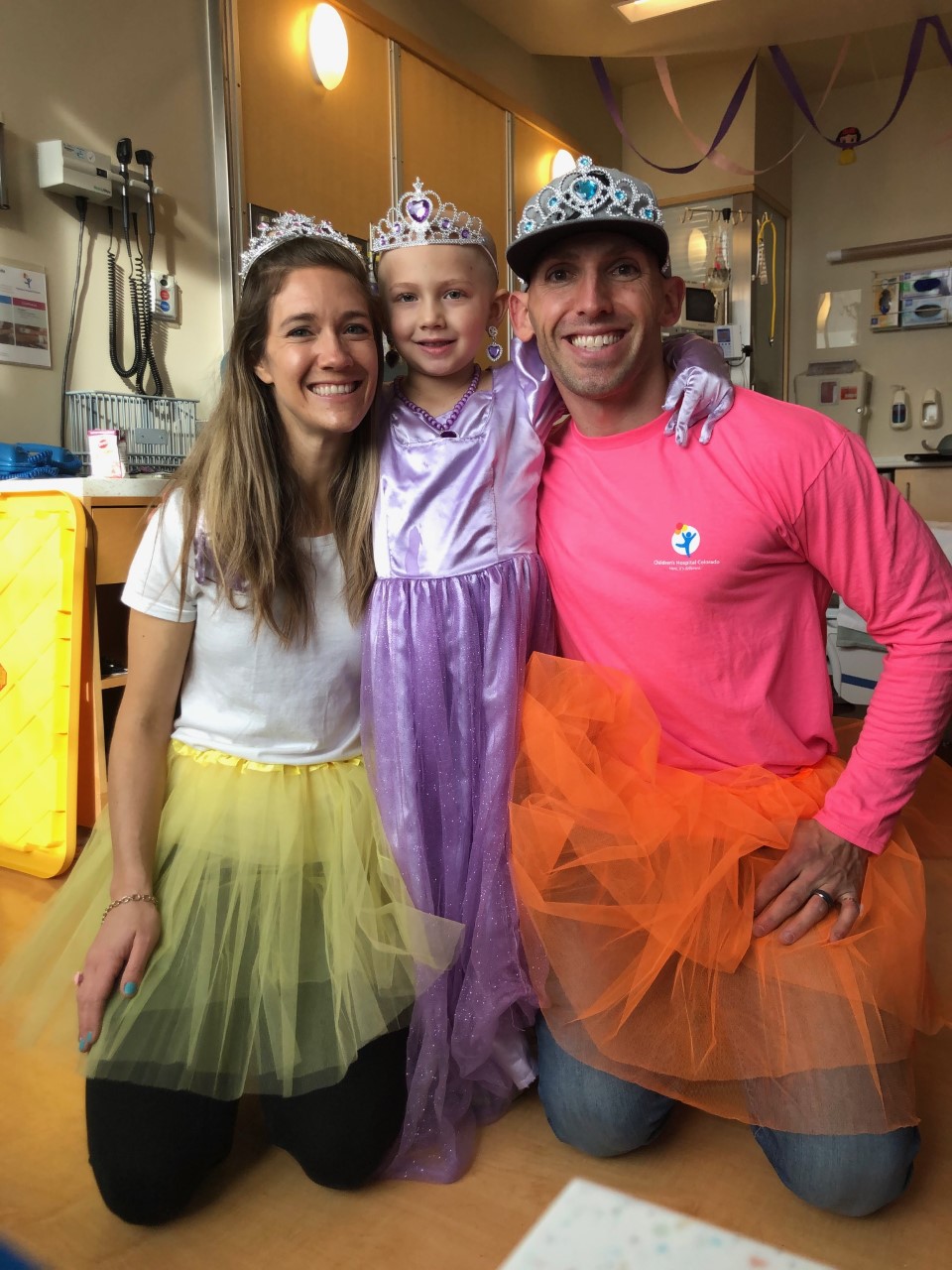 Piper Lardes and her parents, Bailey and Doug, celebrating Piper's fifth birthday at Children’s Hospital Colorado where she was receiving treatment for Ewing’s sarcoma. (Photo courtesy of the Lardes family.)