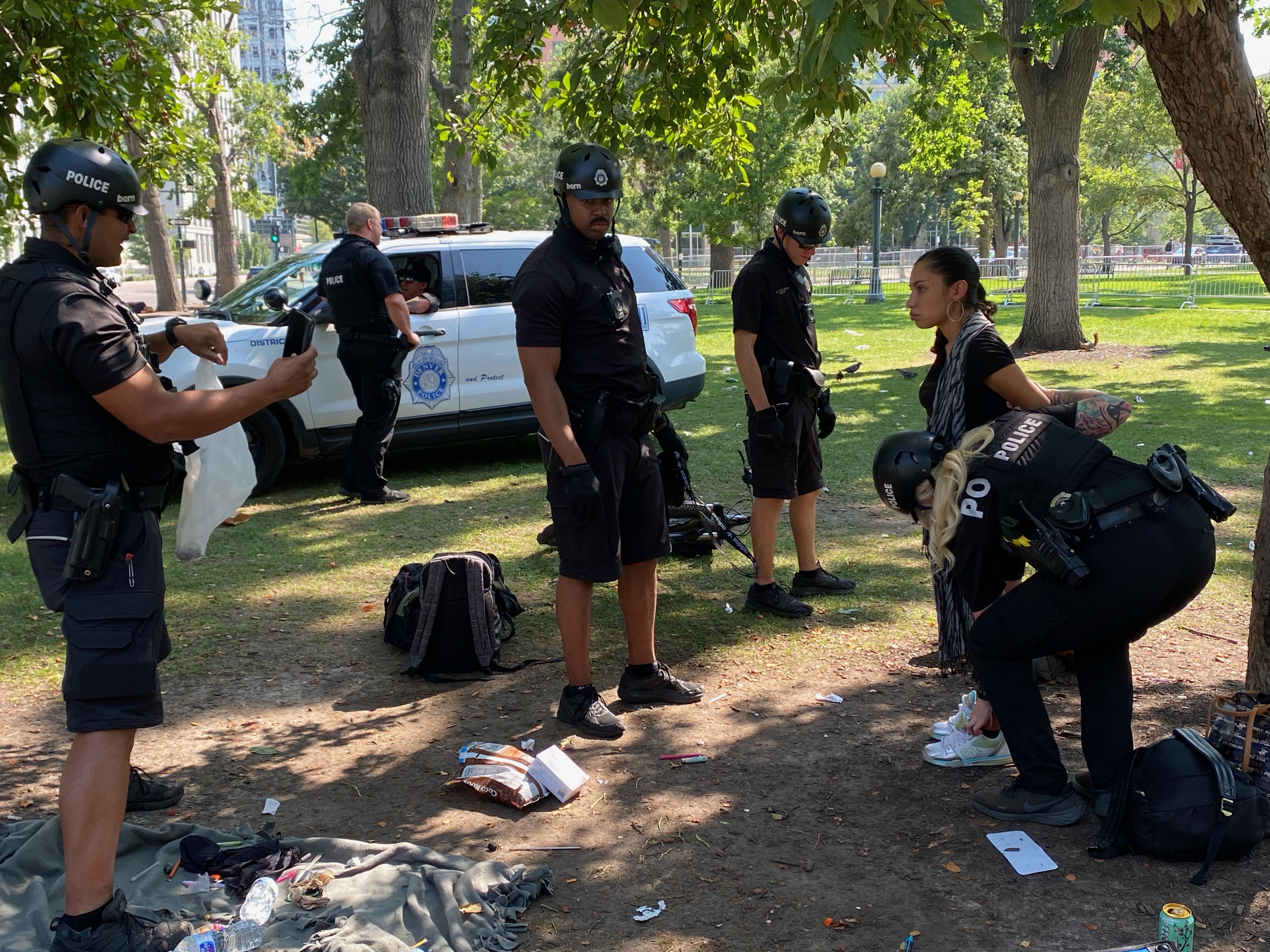 Denver Police officers arrest a woman suspected of being involved with illegal drugs Thursday at Civic Center Park. (CarolMcKinleyDenver Enterprise Reportercarol.mckinley@gazette.comhttps://denvergazette.com/content/tncms/avatars/5/c3/a0f/5c3a0fbe-1007-11ec-9e18-b7f42cfa4b0f.9565a0ce58866e86bcf18260621c2a46.png)