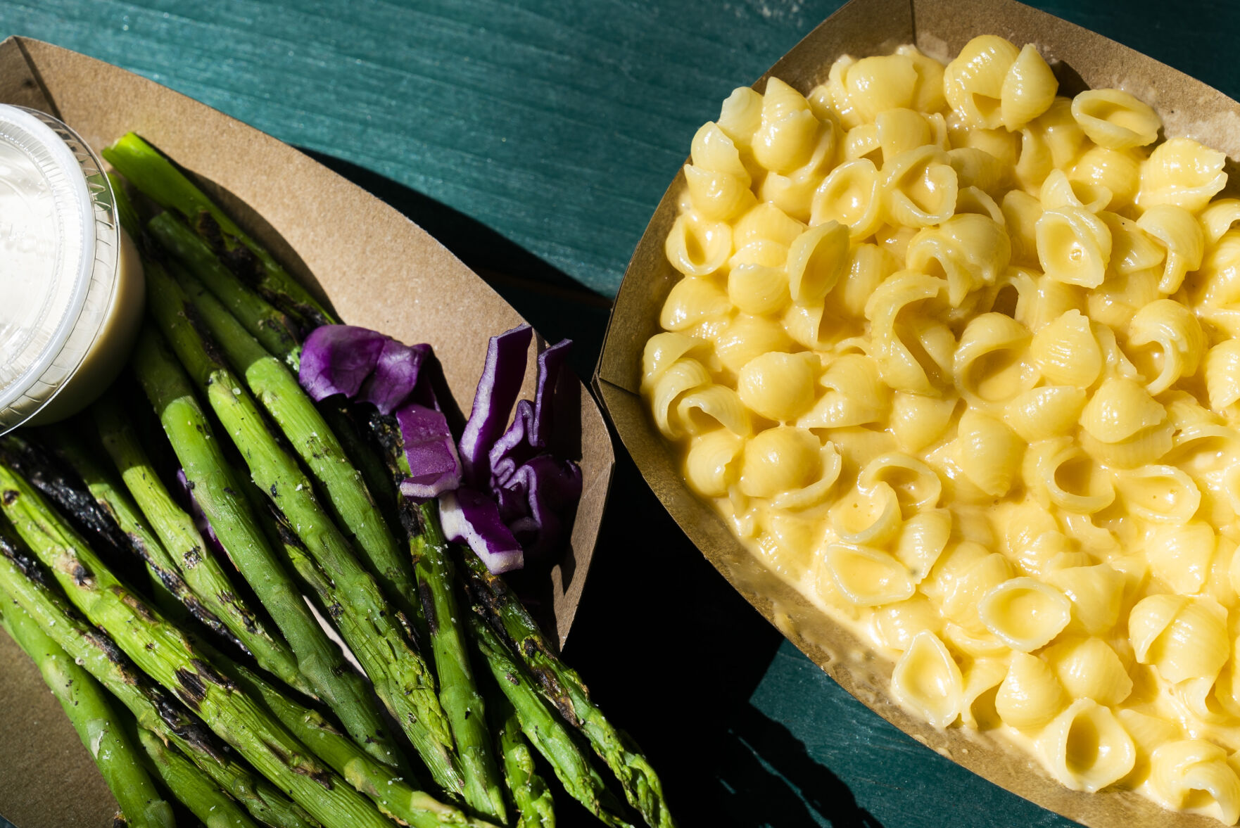 A side of grilled asparagus and mac and cheese on Friday, September 24, 2021 at Switchback Smokehouse in Kittredge. (Photo by Katie Klann/The Gazette) (Katie Klann The Gazette)