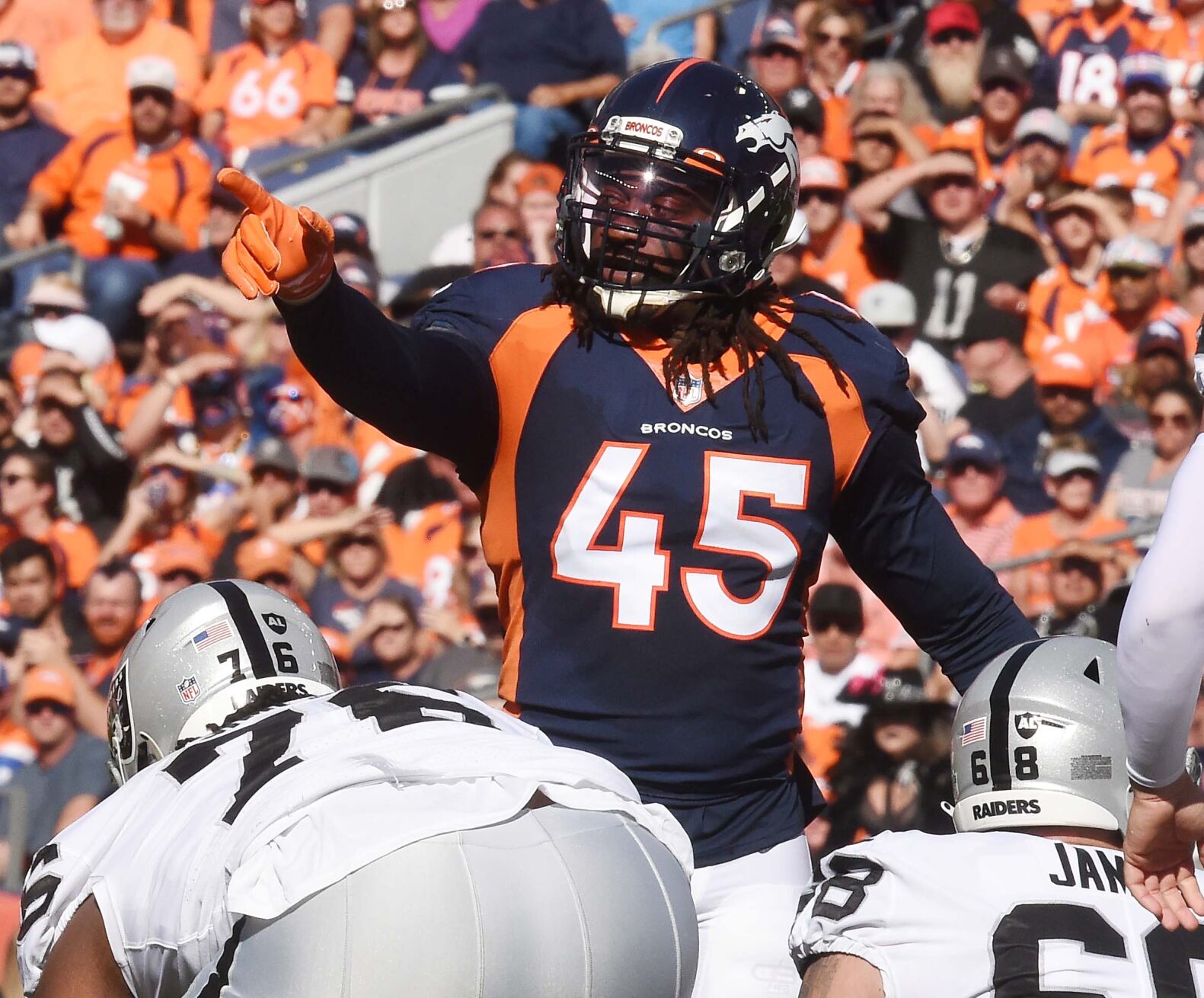 Broncos linebacker A.J. Johnson gives direction to other members of the defense. The Broncos lost to the Raiders 34-24 on Sunday, Oct. 17, 2021 at Empower Field at Mile High Stadium. (Photo by Jerilee Bennett, The Gazette) (Jerilee Bennett)