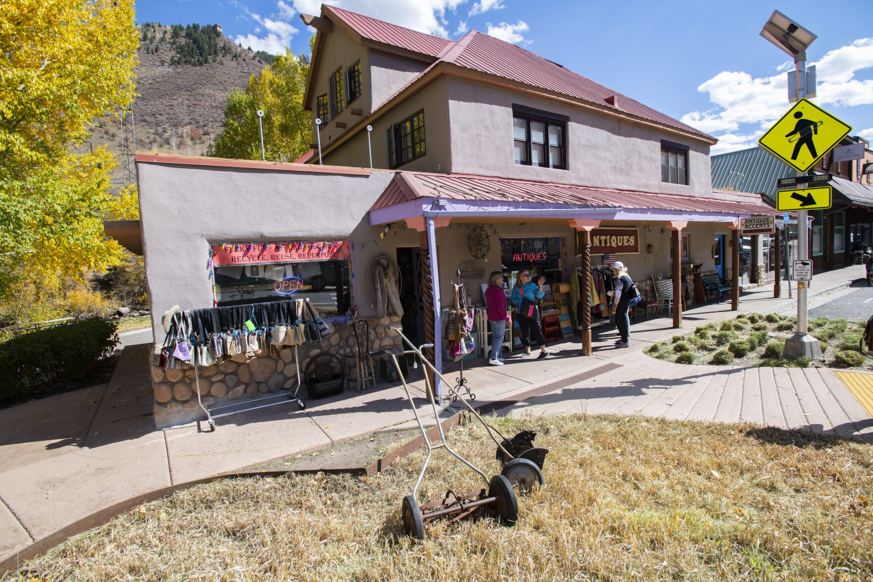 People gather outside the antique shop in Minturn, Colo., Tuesday, Oct. 5, 2021. (The Gazette, Christian Murdock) (Christian Murdock/The Gazette)