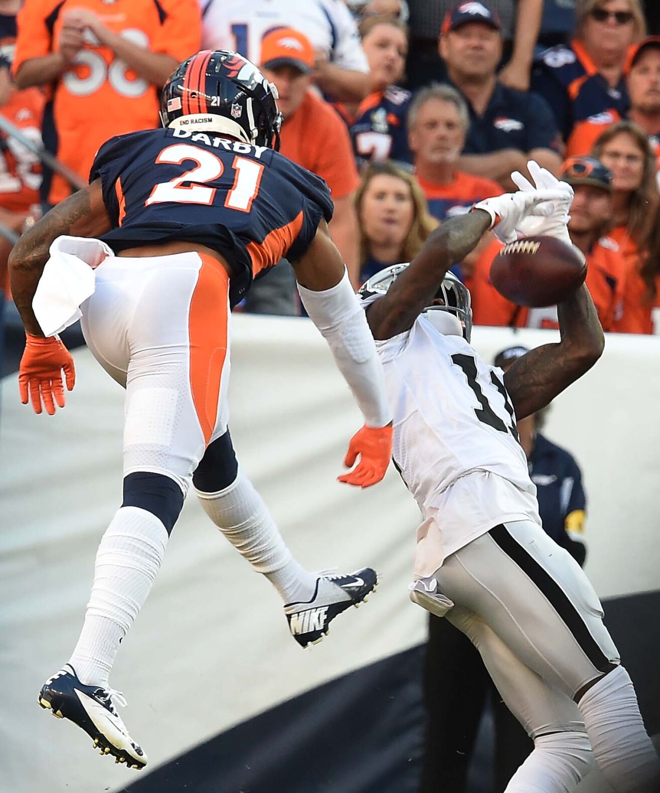 Broncos cornerback Ronald Darby is unable to stop Raiders wide receiver Henry Ruggs III from making a catching the ball at Empower Field at Mile High Stadium on Sunday, Oct. 17, 2021. The Broncos were defeated 34-24. (Photo by Jerilee Bennett, The Gazette)