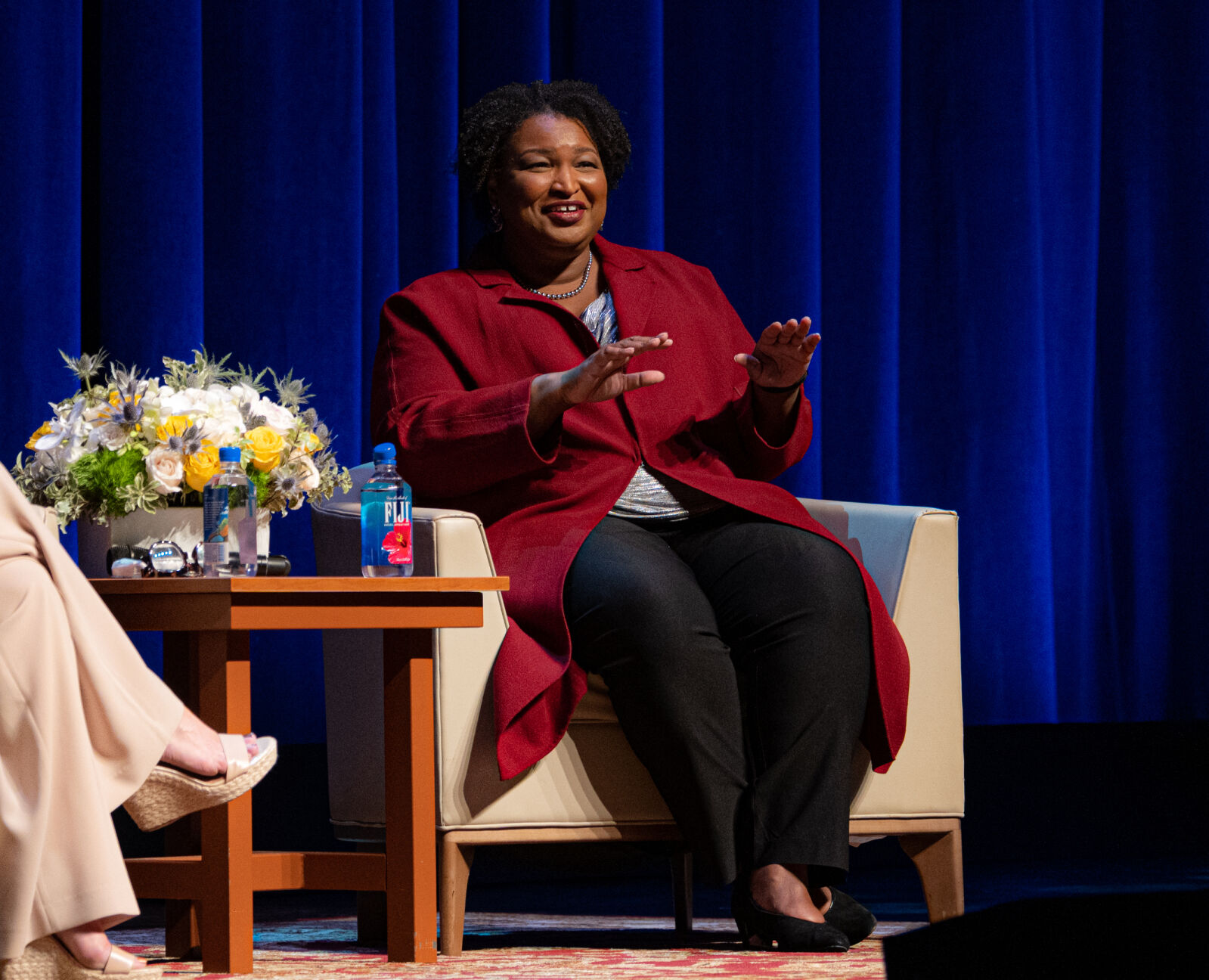 Politician Stacey Abrams talks duringastop in San Antonio. (Photo by John David Scarcliff)