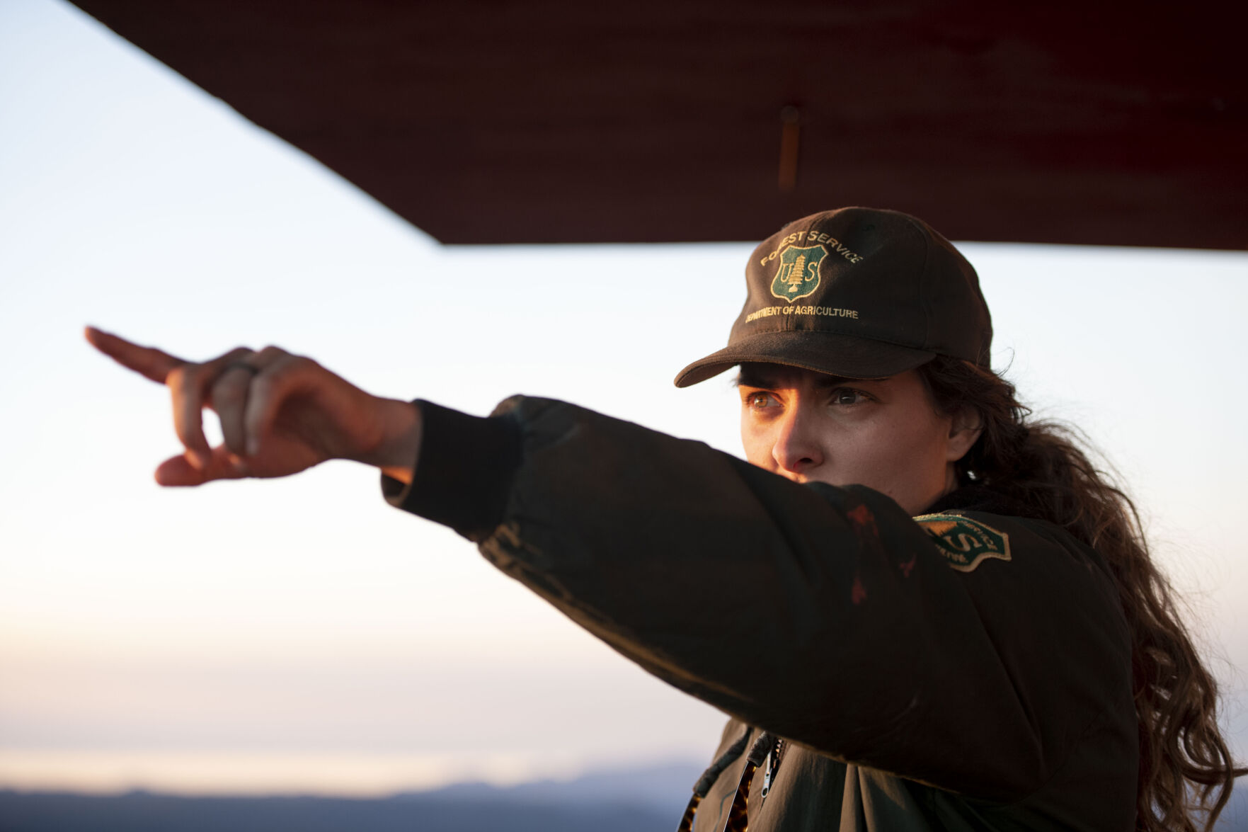 Ashley Farinacci-Silfies, 27, is the fire lookout at the Devil’s Head Fire Lookout Tower outside of Sedalia in the Pike National Forest. (Chancey Bush/The Gazette)