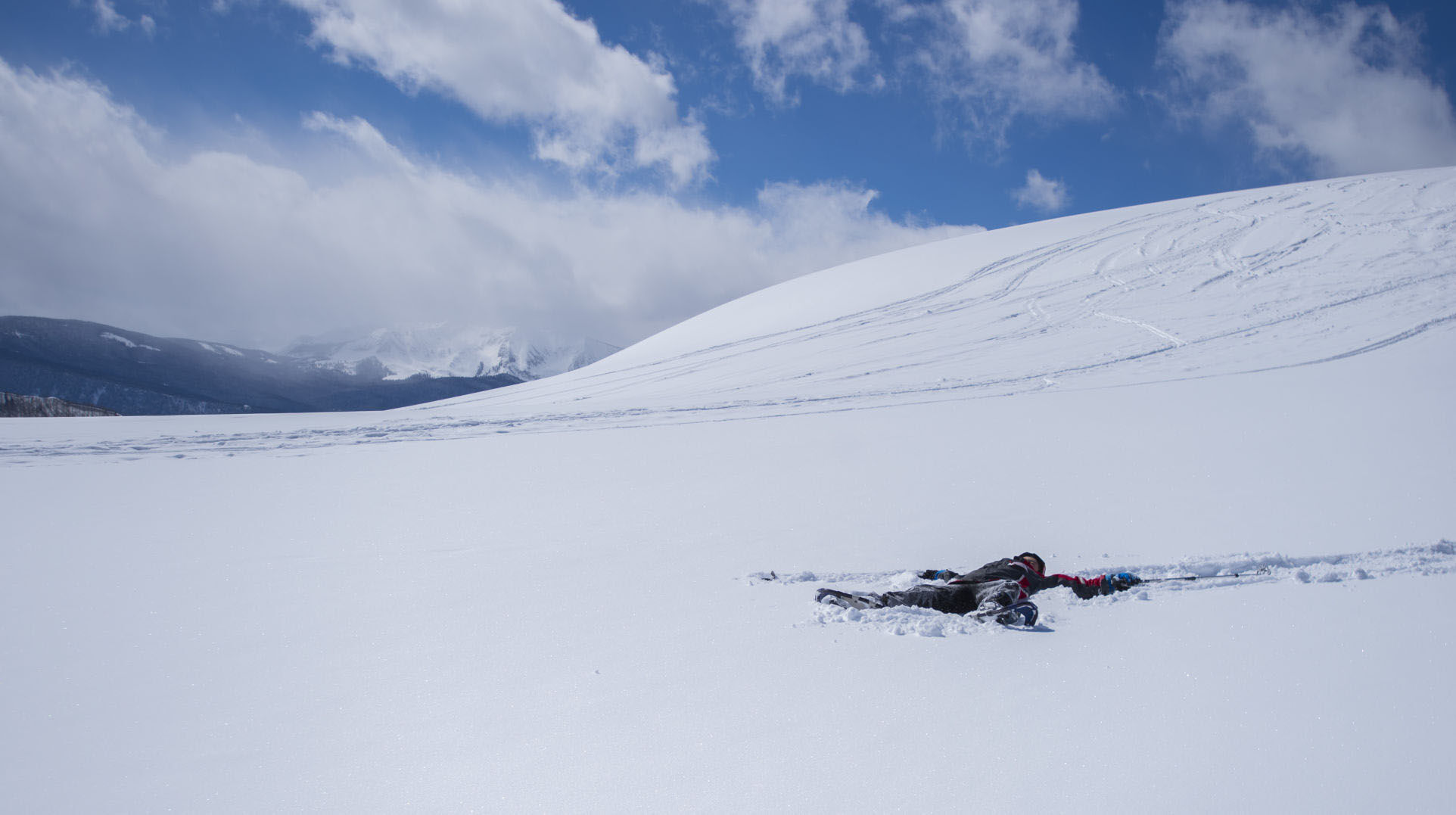 Liam Price, 9, of Colorado Springs makes a snow angel along the Snodgrass Trail Sunday, Feb. 26, 2017, near Mt. Crested Butte. (The Gazette, Christian Murdock)