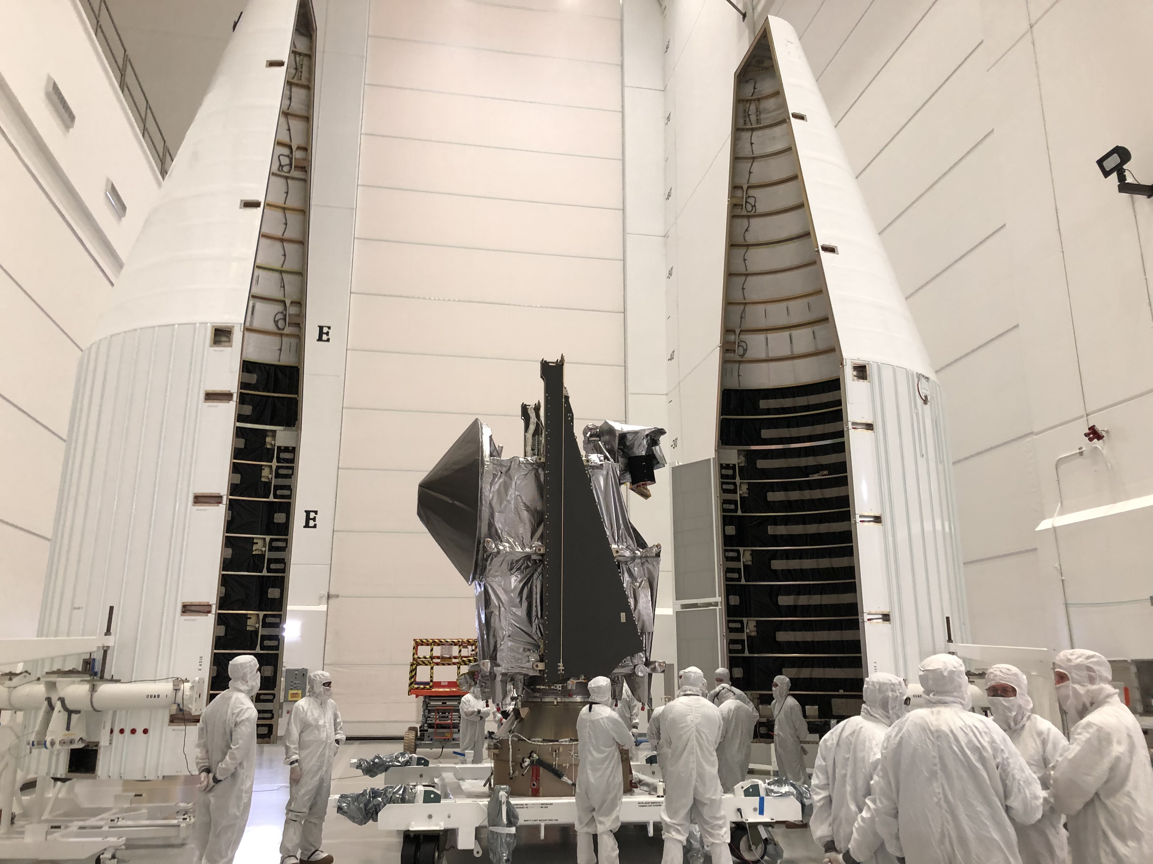 NASA's Lucy spacecraft, wrapped in black, being loaded on the capsule that will sit atop a United Launch Alliance Atlas V rocket. Launch is scheduled for 4:34 a.m. MST Saturday. (Courtesy of United Launch Alliance)