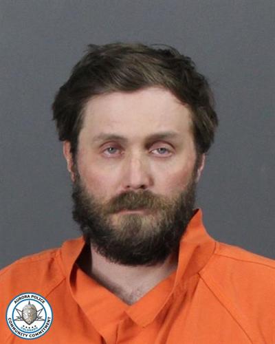 Armed man under red flag order arrested after several-hour standoff in Aurora