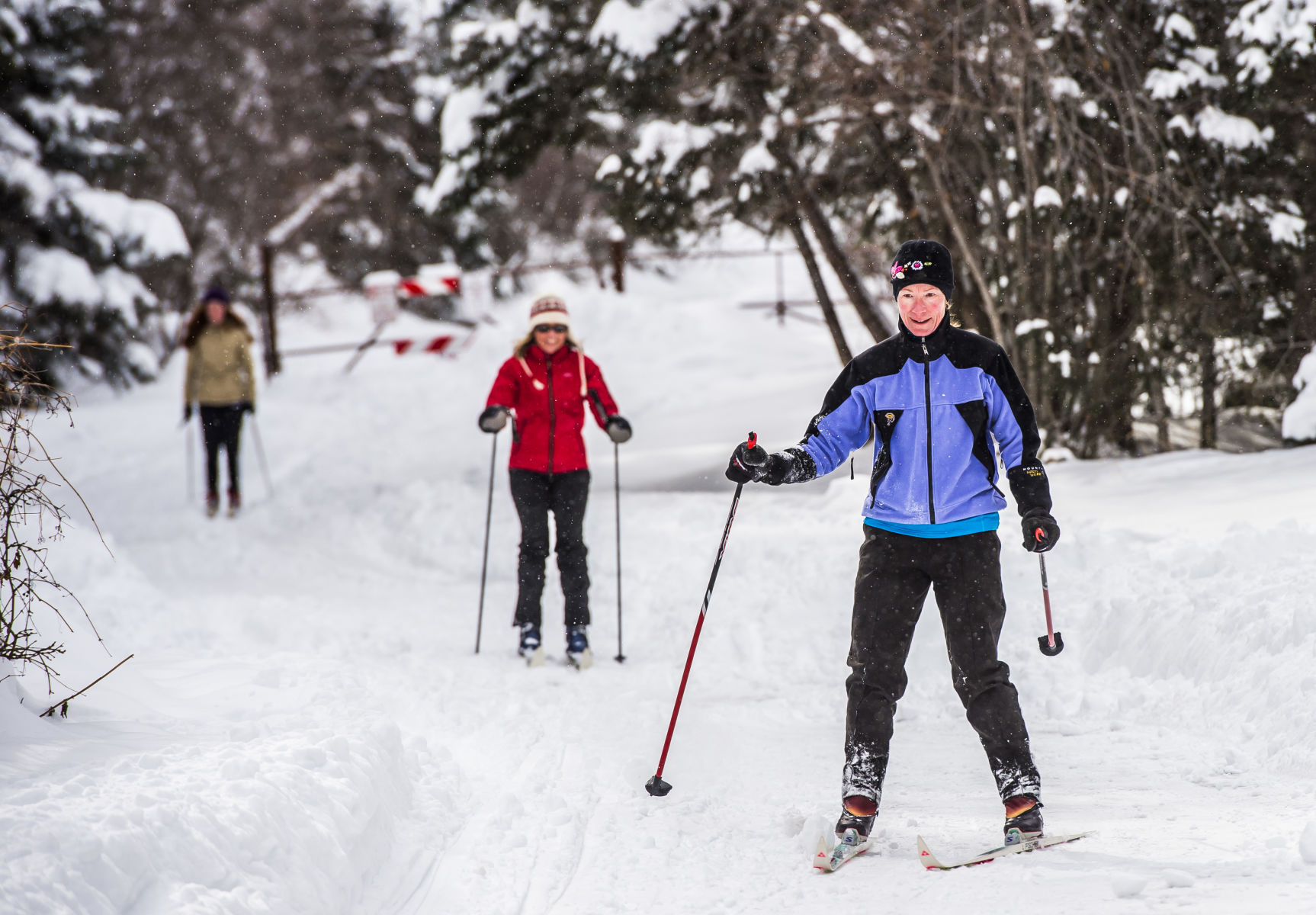 Denise Spangler, Tina Vidovich and Ava Spangler cross-country ski down High Drive off of Gold Camp Road in Colorado Springs. Gazette file