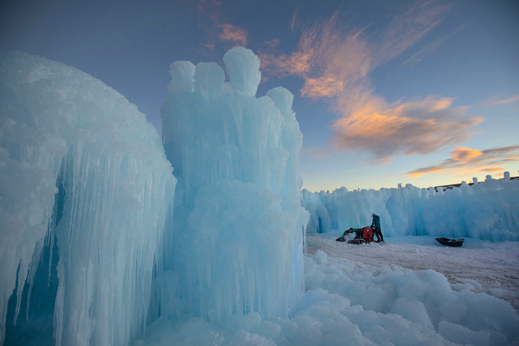 Ethan Jacobson uses equipment to grade snow and ice inside the Dillon Ice Castles in DilloninDecember. (Photos by Chancey Bush, The Gazette)