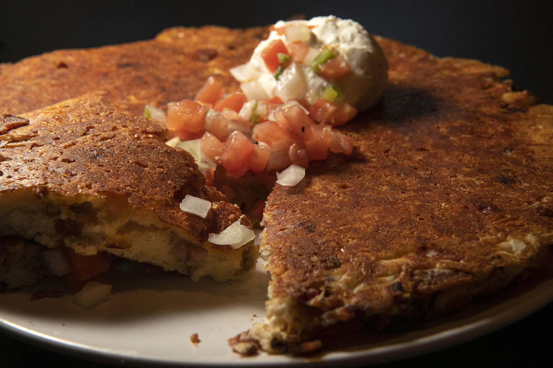 Three-meat griddle cake at Three Little Griddles. Expect a bite of meat in every forkful. (photos by Three-meat griddle cake at Three Little Griddles. Expect a bite of meat in every forkful.)