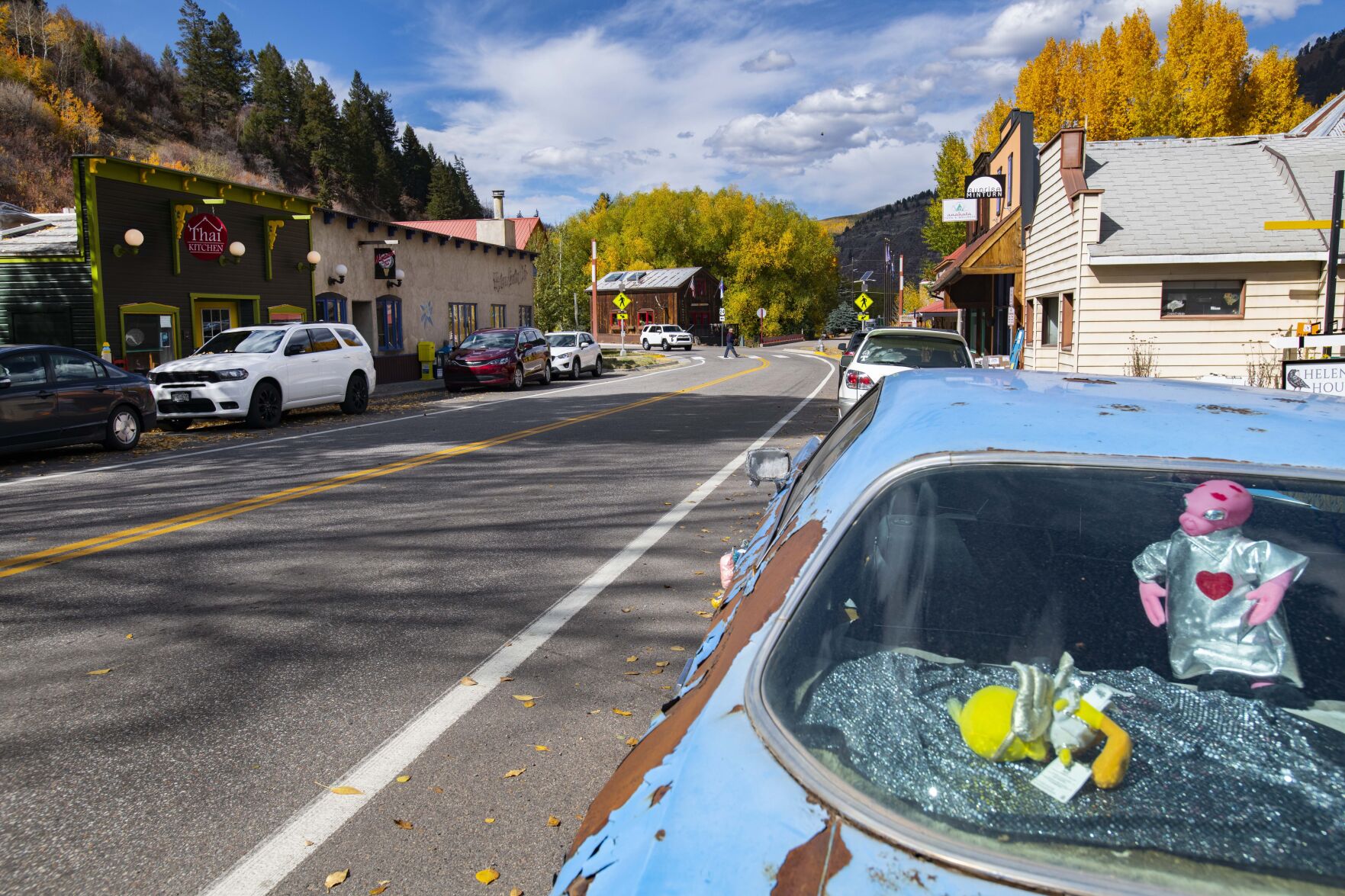 Aliens sit in the window of an old car along U.S. 24 through Minturn. (photos by Christian Murdock, The Gazette)