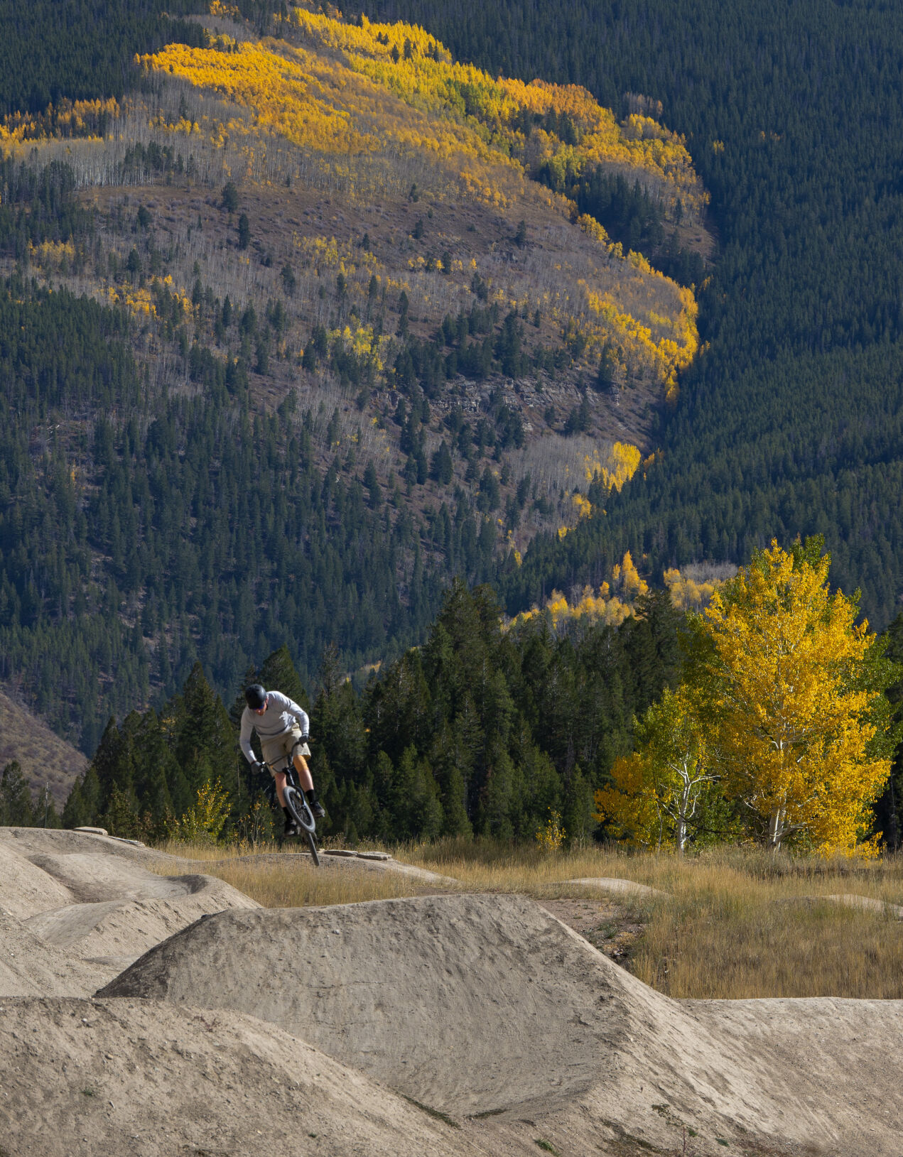 A bicylist plays in the Minturn Bike Park as the aspens turn gold on a fall afternoon this month. (Christian Murdock/The Gazette)