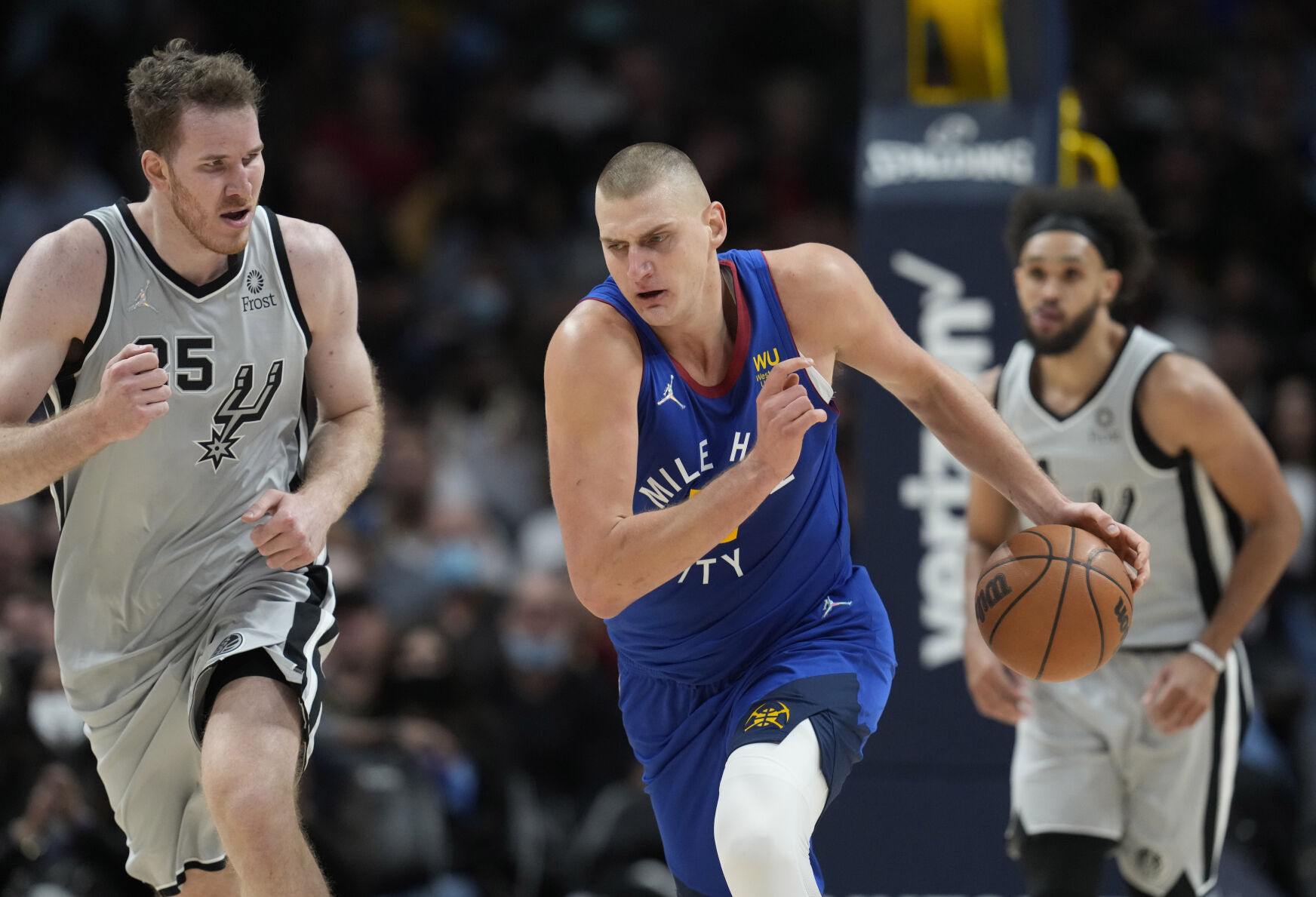 Nikola Jokic leads Denver Nuggets over San Antonio Spurs in home opener