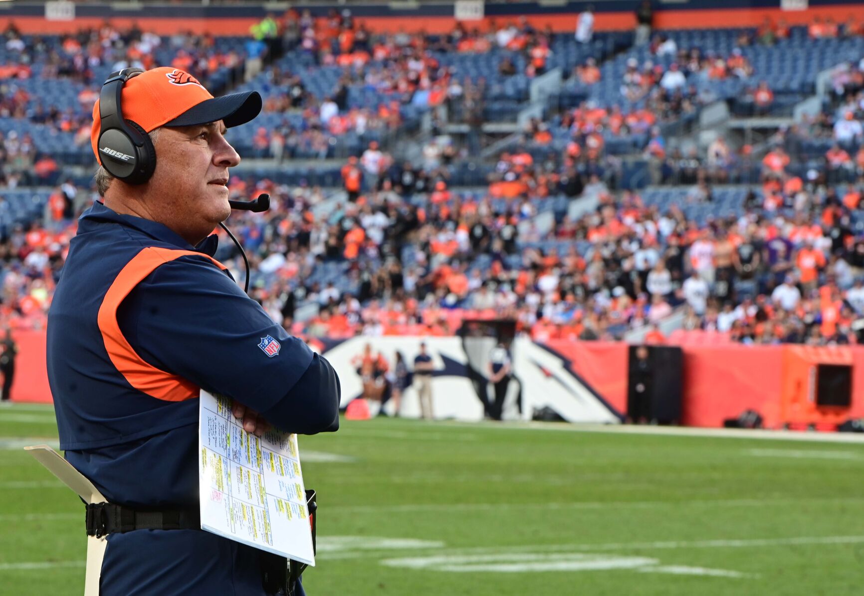 Broncos coach Vic Fangio looks towards the end zone near the end of the game against the Oakland Raiders Sunday at Empower Field at Mile High Stadium in Denver. The stadium was nearly empty by the end of the game. The Broncos lost 34-24. (Jerilee Bennett, The Gazette)