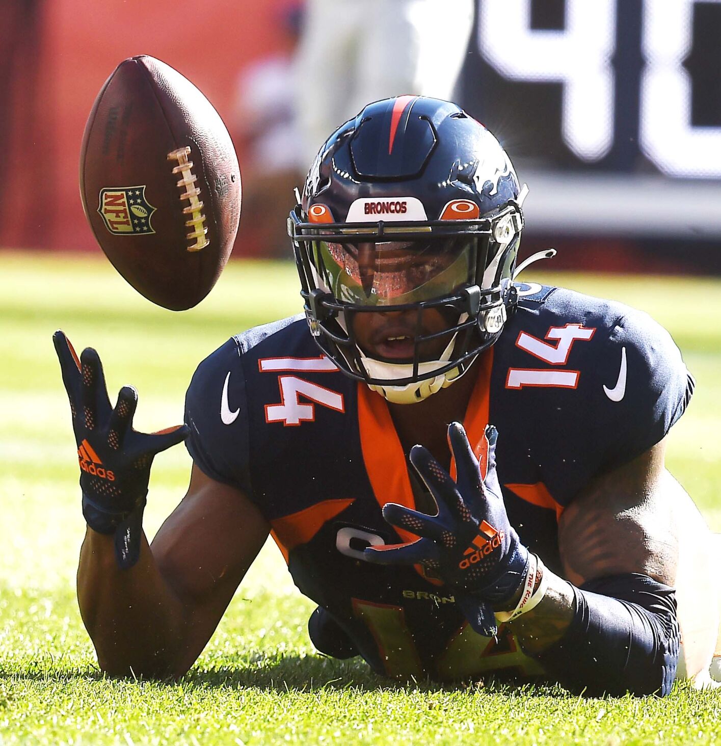 Broncos wide receiver Courtland Sutton watches the ball bounce after the throw slips out of his hands during the second quarter of a game against the Raiders at Empower Field at Mile High Stadium on Sunday, Oct. 17, 2021. The Broncos were defeated 34-24. (Photo by Jerilee Bennett, The Gazette)