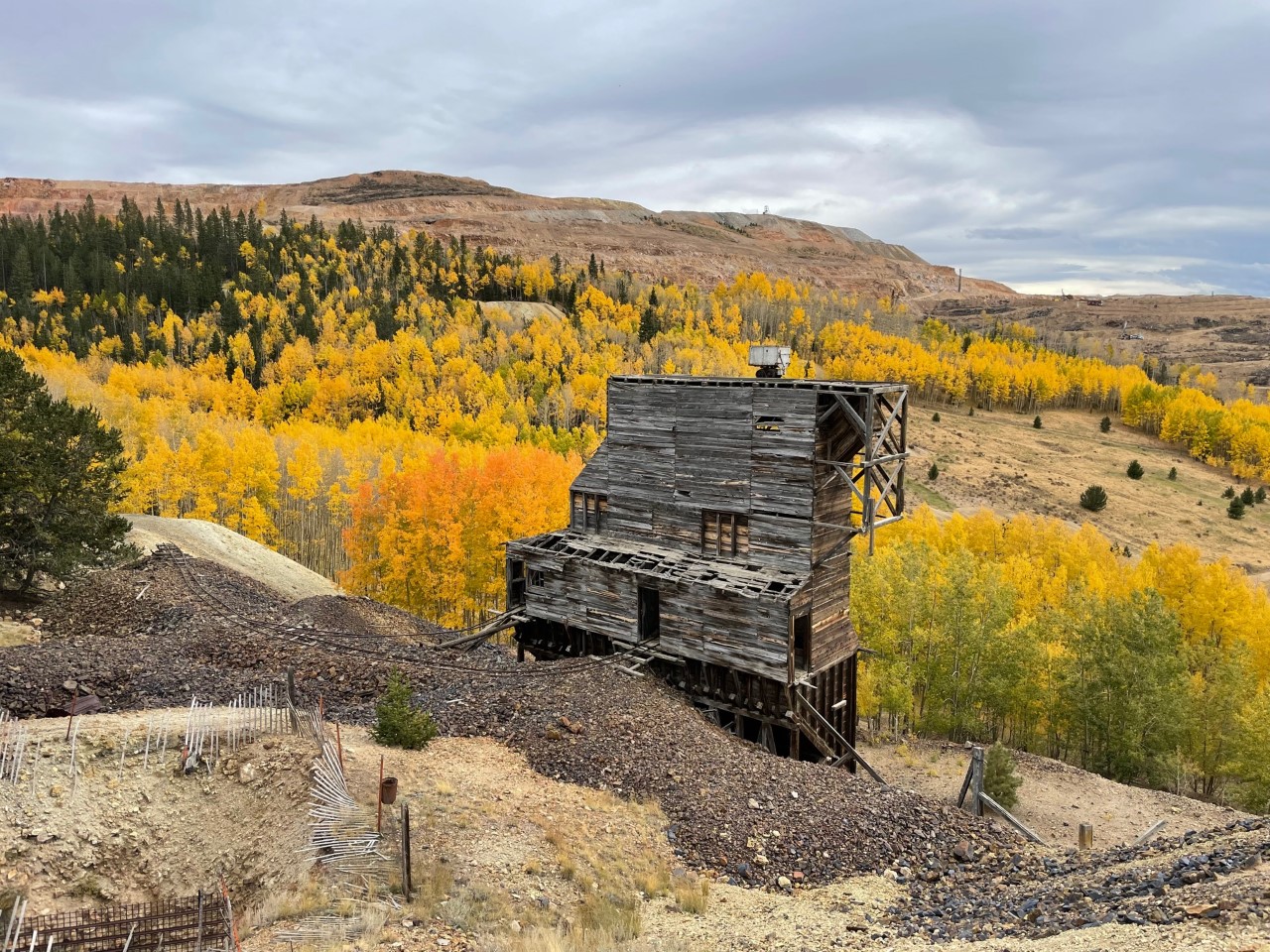 Aspens and mining ruins surround the Mollie Kathleen Gold Mine. Photo Credit: Spencer McKee.