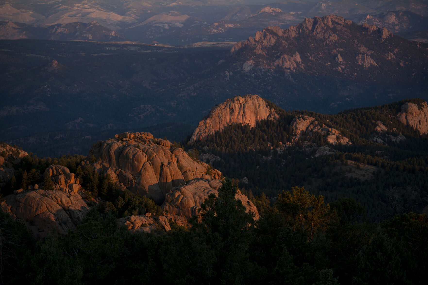 The rugged terrain of the surrounding area of Pike National Forest. Ashley Farinacci-Silfies, 27, is the fire lookout at the Devil’s Head Fire Lookout Tower outside of Sedalia in the Pike National Forest. The lookout stands at 9,748 feet in elevation and is the last of four original Front Range fire lookout towers still in operation. Farinacci-Silfies just finished up her second season after taking over the duty from Bill Ellis, who finished his 35th season and retired at the age of 87. (Chancey Bush/The Gazette)