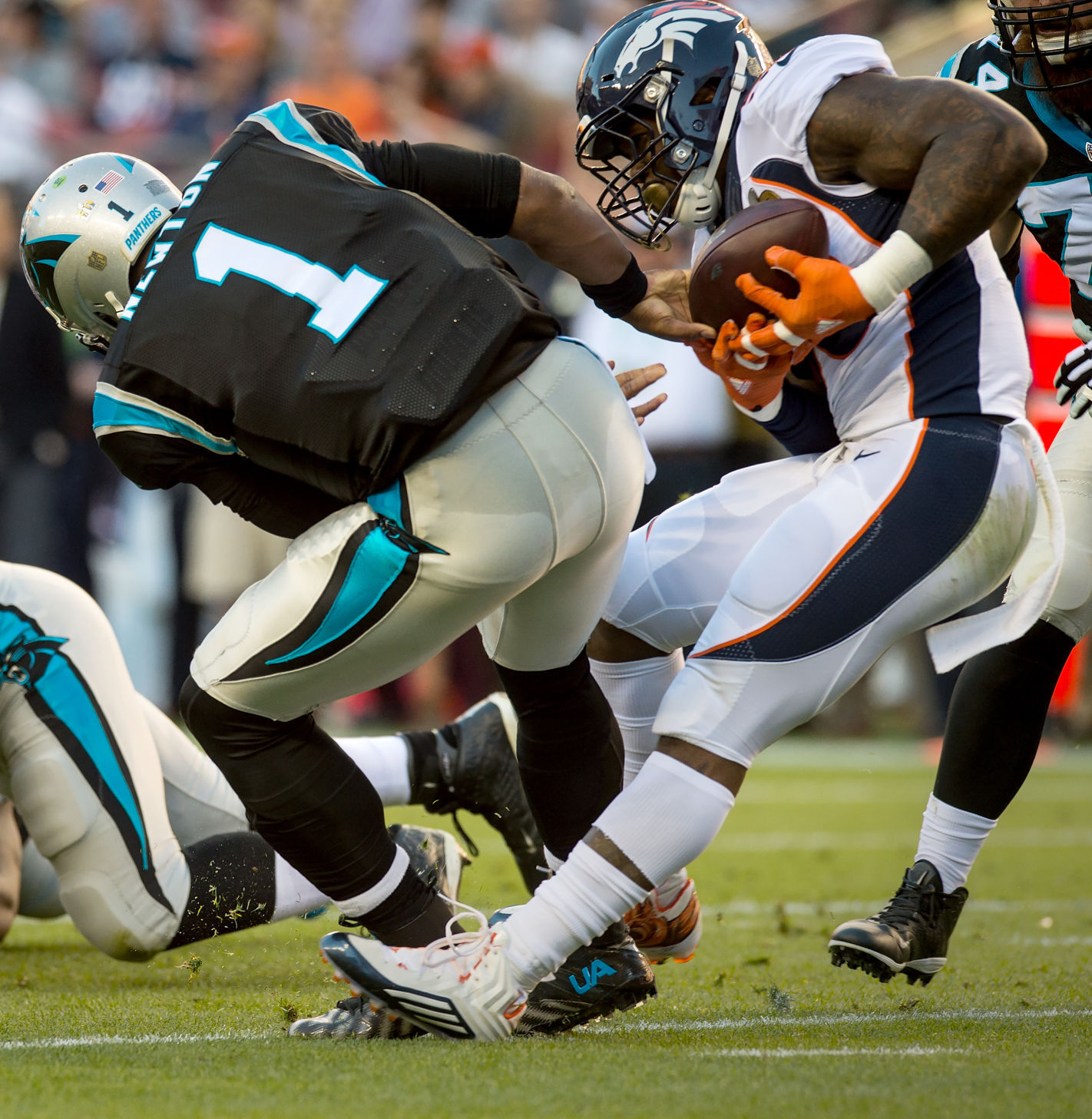 Denver linebacker Von Miller strips the ball from Carolina quarterback Cam Newton during the first quarter of Super Bowl 50 Sunday, Feb. 7, 2016, at Levi's Stadium in Santa Clara, Calif. Denver defensive end Malik Jackson recovered it in the end zone for a Broncos’ touchdown. (The Gazette, Christian Murdock)