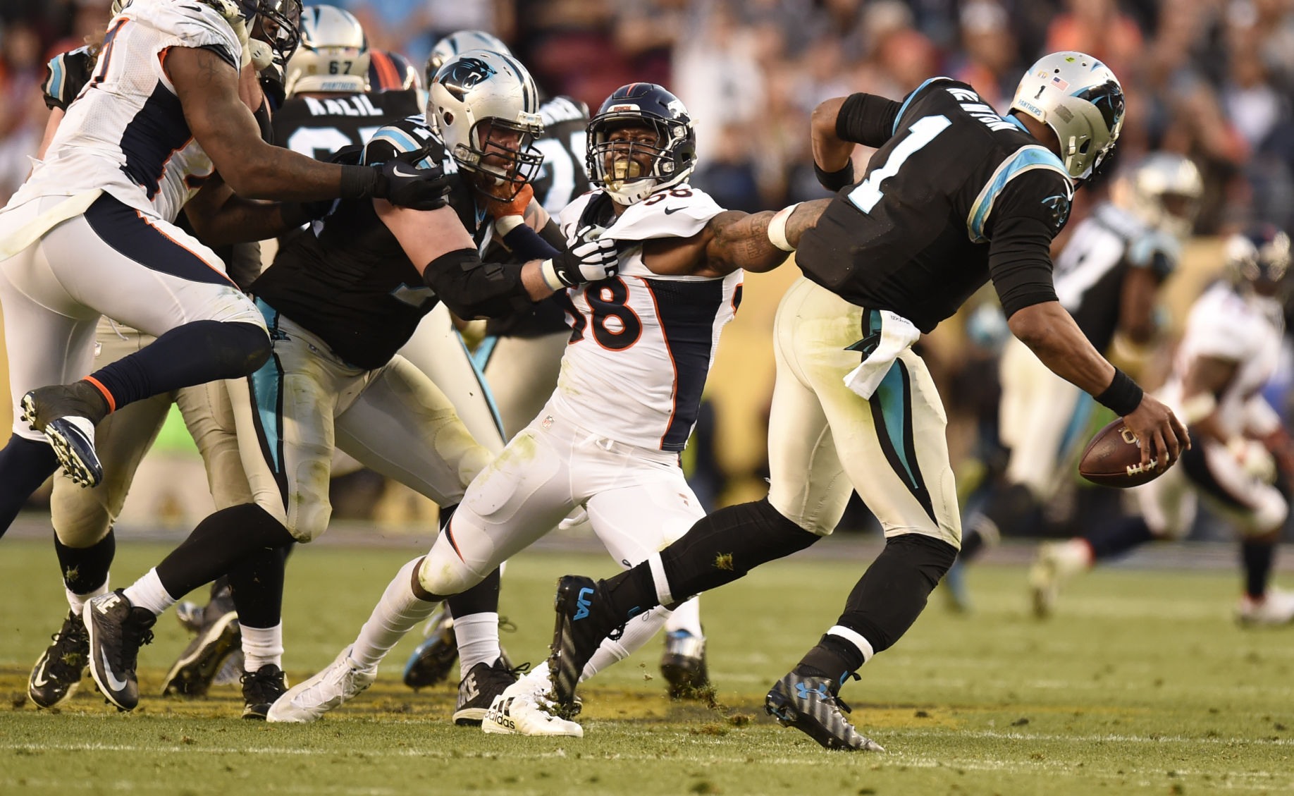 Broncos linebacker Von Miller grabs Panthers quarterback Cam Newton in the second quarter of Denver's 24-10 win in Super Bowl 50 Sunday, February 7, 2016 at Levi's Stadium in Santa Clara, California. Photo by Mark Reis, The Gazette (MARK REIS)