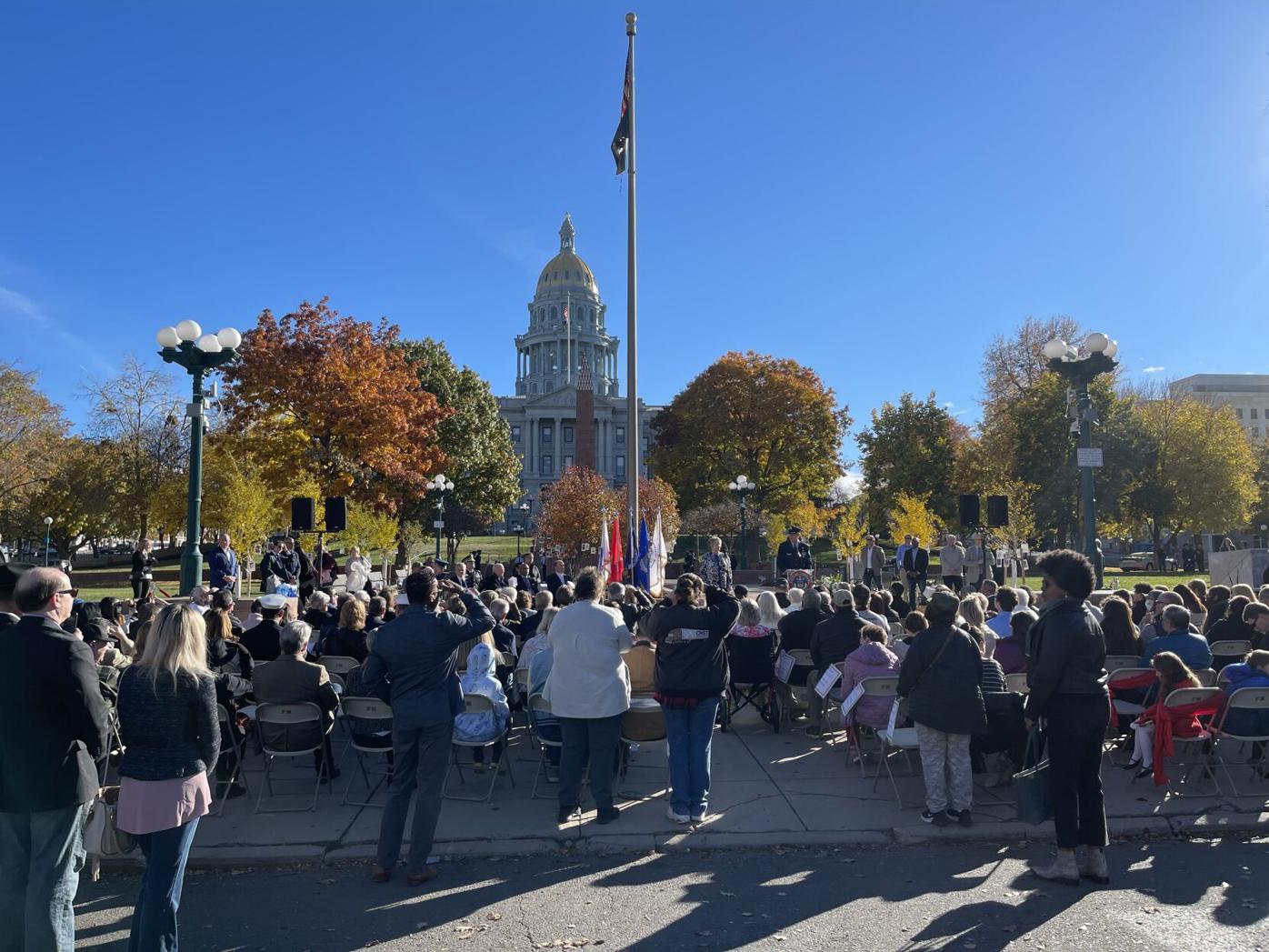 Hundreds celebrate Veterans Day early around downtown Denver on Saturday
