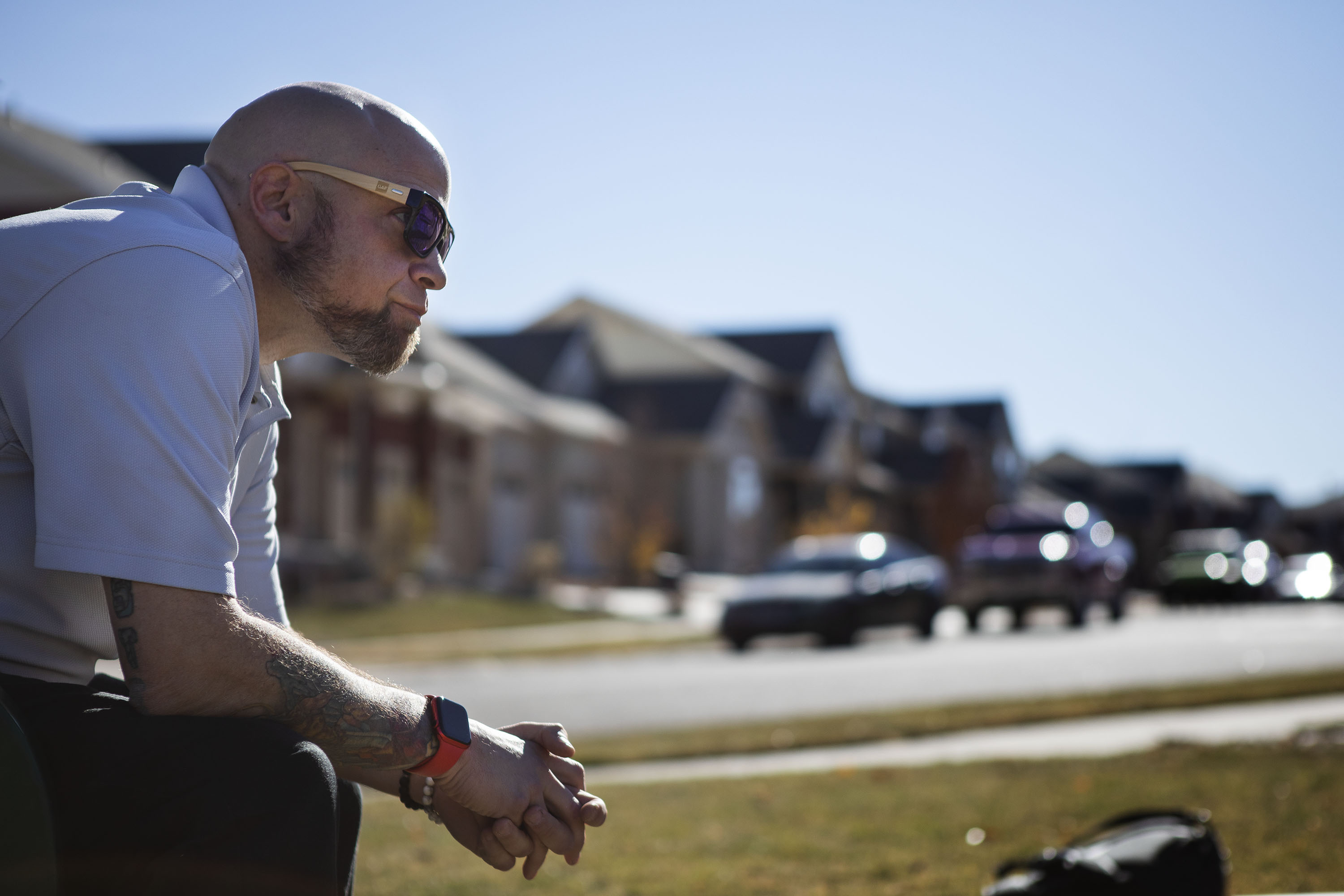 Todd Blitstein, the father of Peyton Blitstein, pauses at a park bench near the street where his 17-year-old son was shot and killed during an altercation last Wednesday, as seen on Tuesday, Nov. 30, 2021, in Aurora, Colo. (Timothy Hurst/The Gazette) (Timothy Hurst)