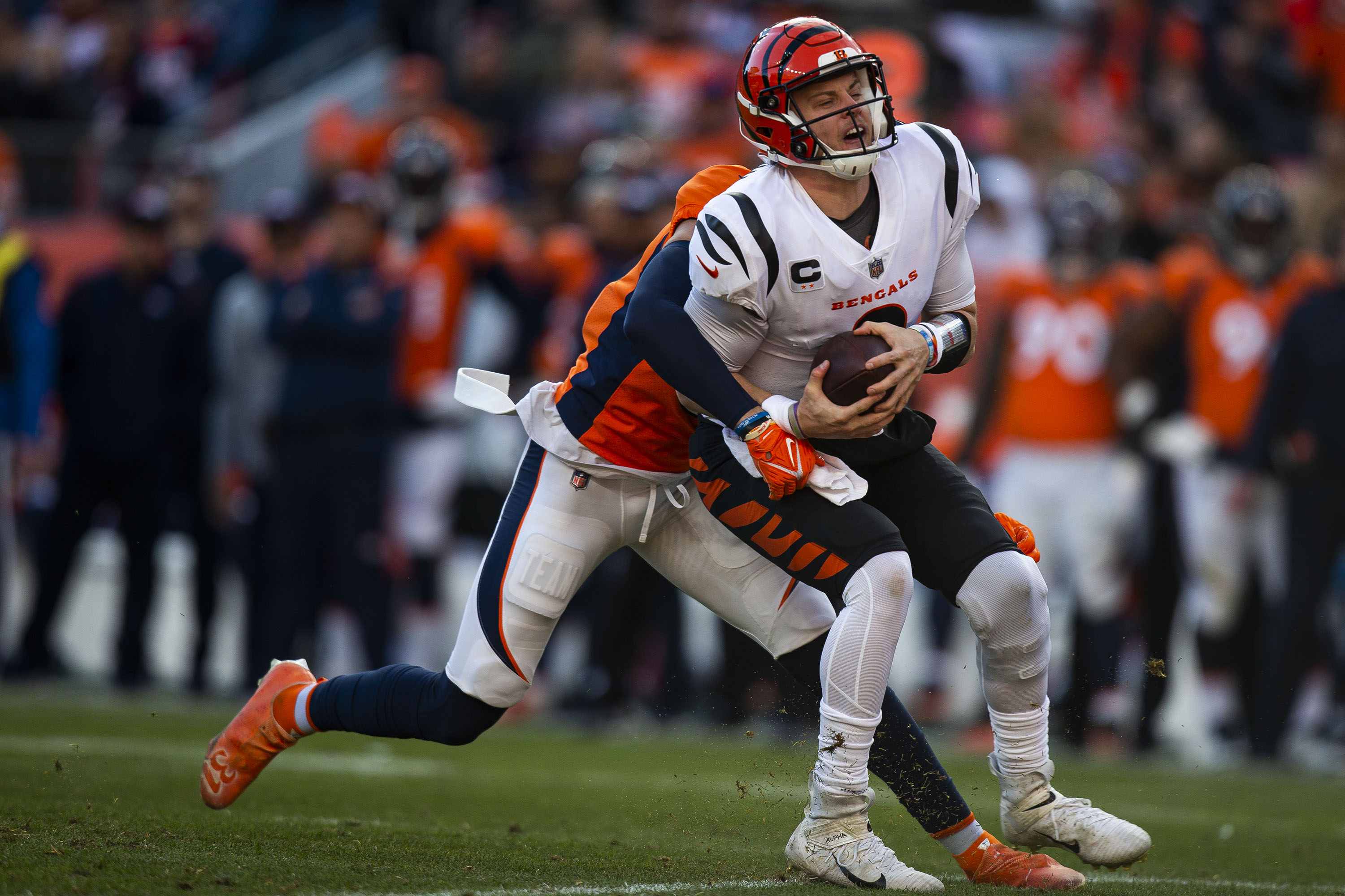 Denver Broncos safety Justin Simmons (31) sacks Cincinnati Bengals quarterback Joe Burrow (9) during the first half on Sunday, Dec. 19, 2021, at Empower Field at Mile High in Denver, Colo. (Timothy Hurst/The Gazette) (TimHursttim.hurst@gazette.comhttps://secure.gravatar.com/avatar/aca82bd62b4ee425c598527cd6faa1b1?d=mm&r=g)