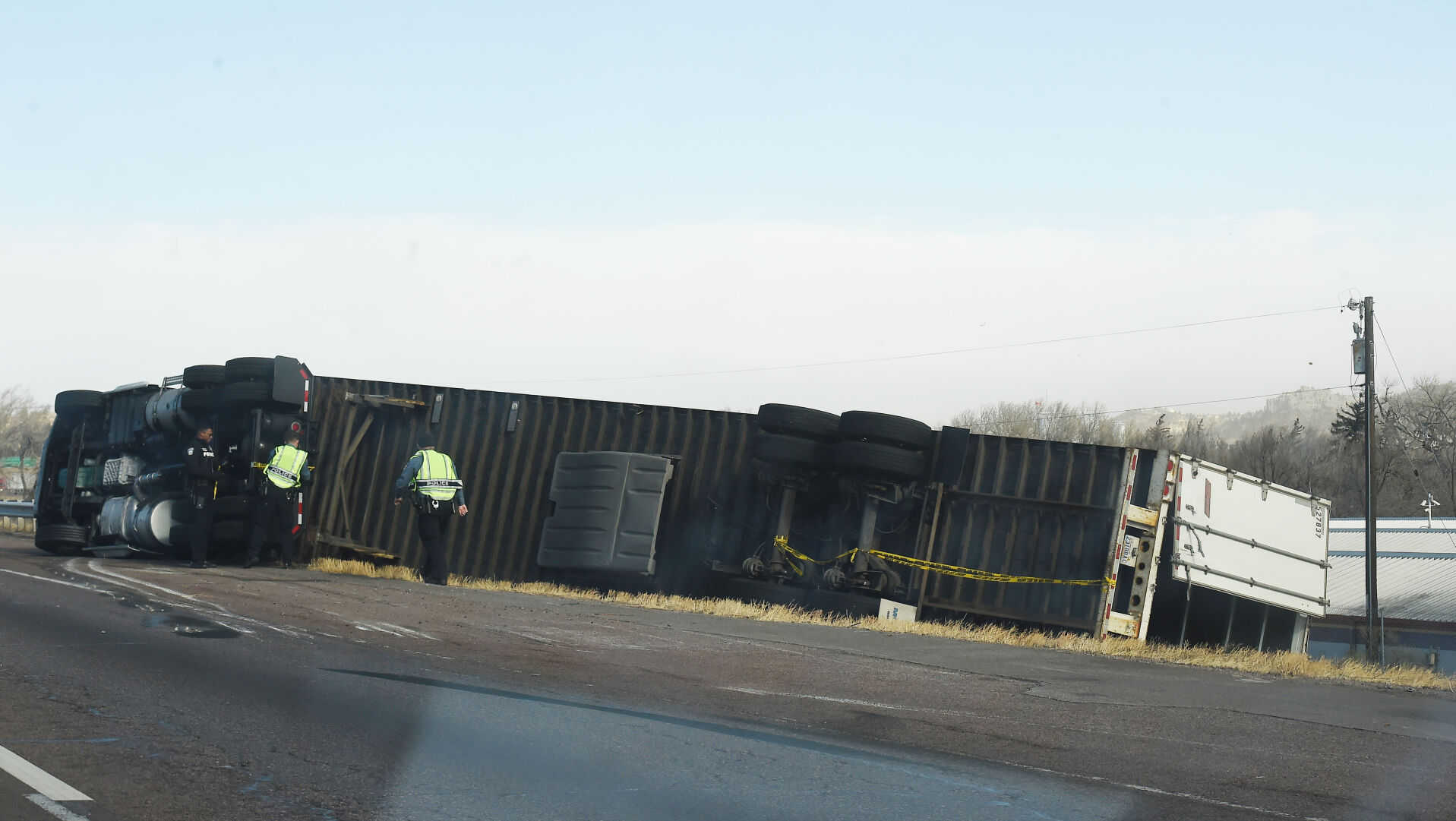 High winds toppled a semi-truck on I-25 in the northbound lane just past Garden of the Gods Rd. on Wednesday, Dec. 15, 2021. (Photo by Jerilee Bennett, The Gazette) (Jerilee Bennett)