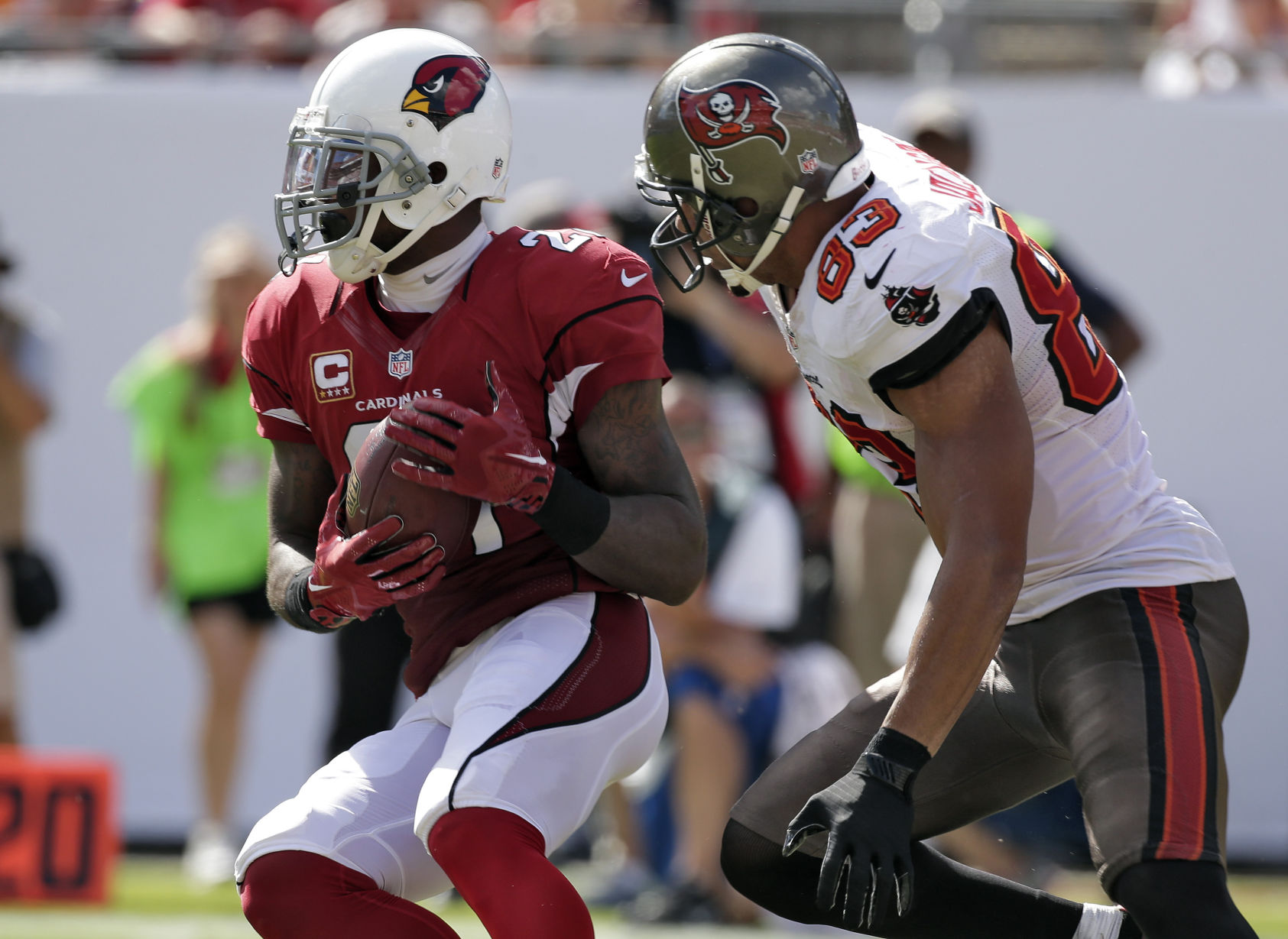 Arizona Cardinals cornerback Patrick Peterson (21) intercepts a pass intended for Tampa Bay Buccaneers wide receiver Vincent Jackson (83) during the fourth quarter of an NFL football game on Sunday, Sept. 29, 2013, in Tampa, Fla. (AP Photo/Chris O'Meara) (Chris O'Meara)