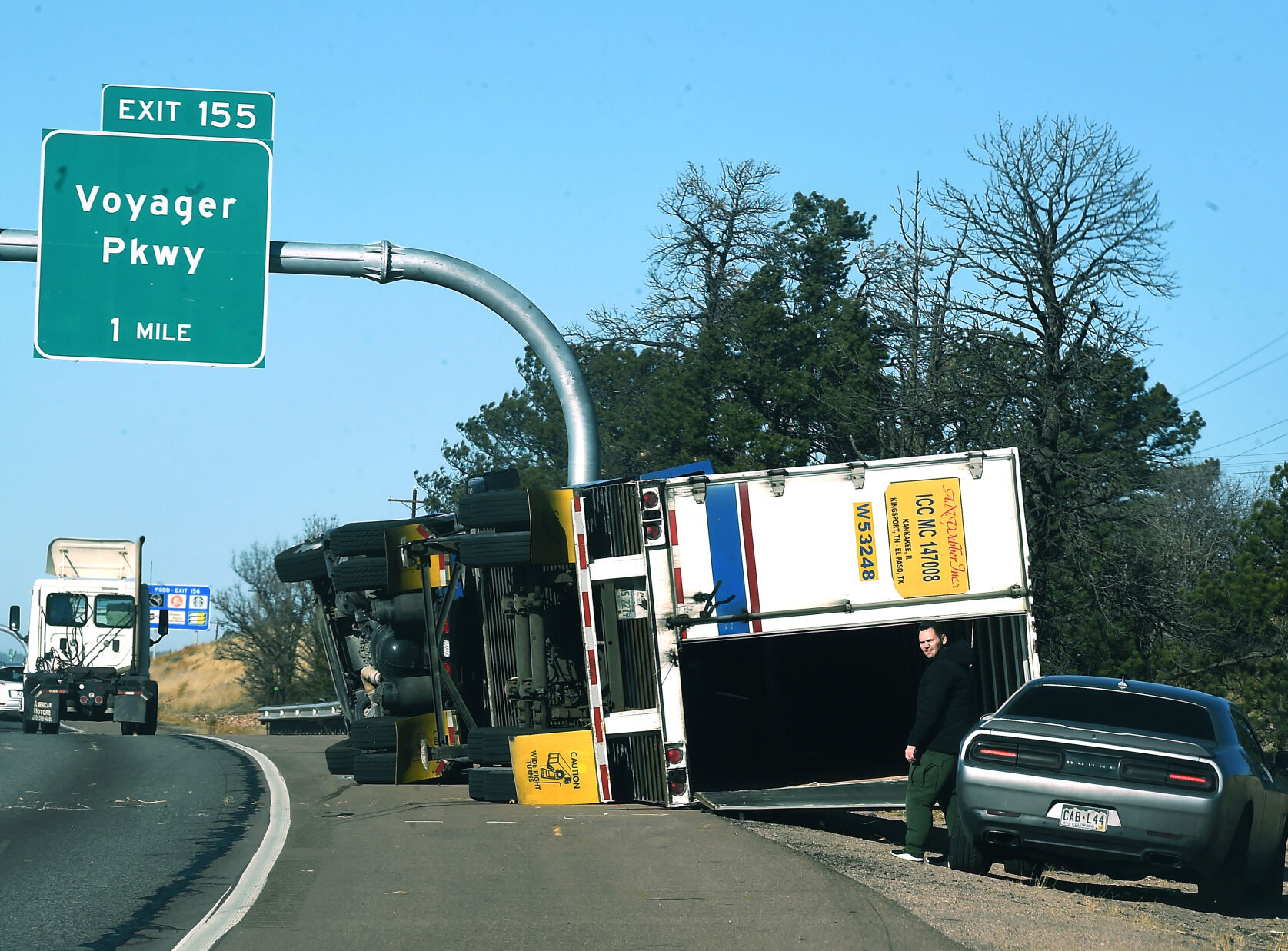 High winds toppled a semi-truck on I-25 in the northbound lane on Wednesday, Dec. 15, 2021. There were over a dozen semi-trucks that were toppled on I-25 in the Pikes Peak region. (Photo by Jerilee Bennett, The Gazette) (Jerilee Bennett)