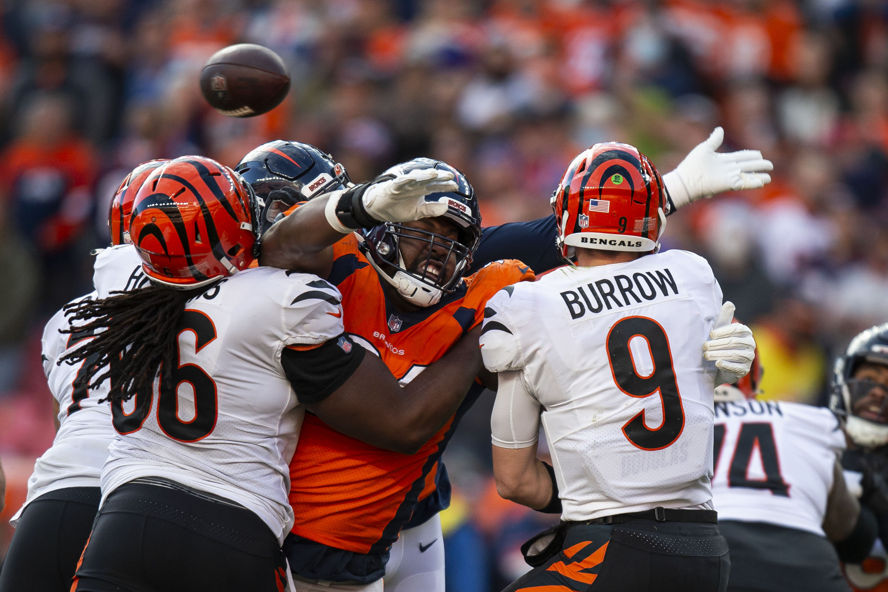 Denver Broncos defensive end Shelby Harris (96) rushes the throw by Cincinnati Bengals quarterback Joe Burrow (9) on Sunday, Dec. 19, 2021, at Empower Field at Mile High in Denver, Colo. (Timothy Hurst/The Gazette) (Timothy Hurst)