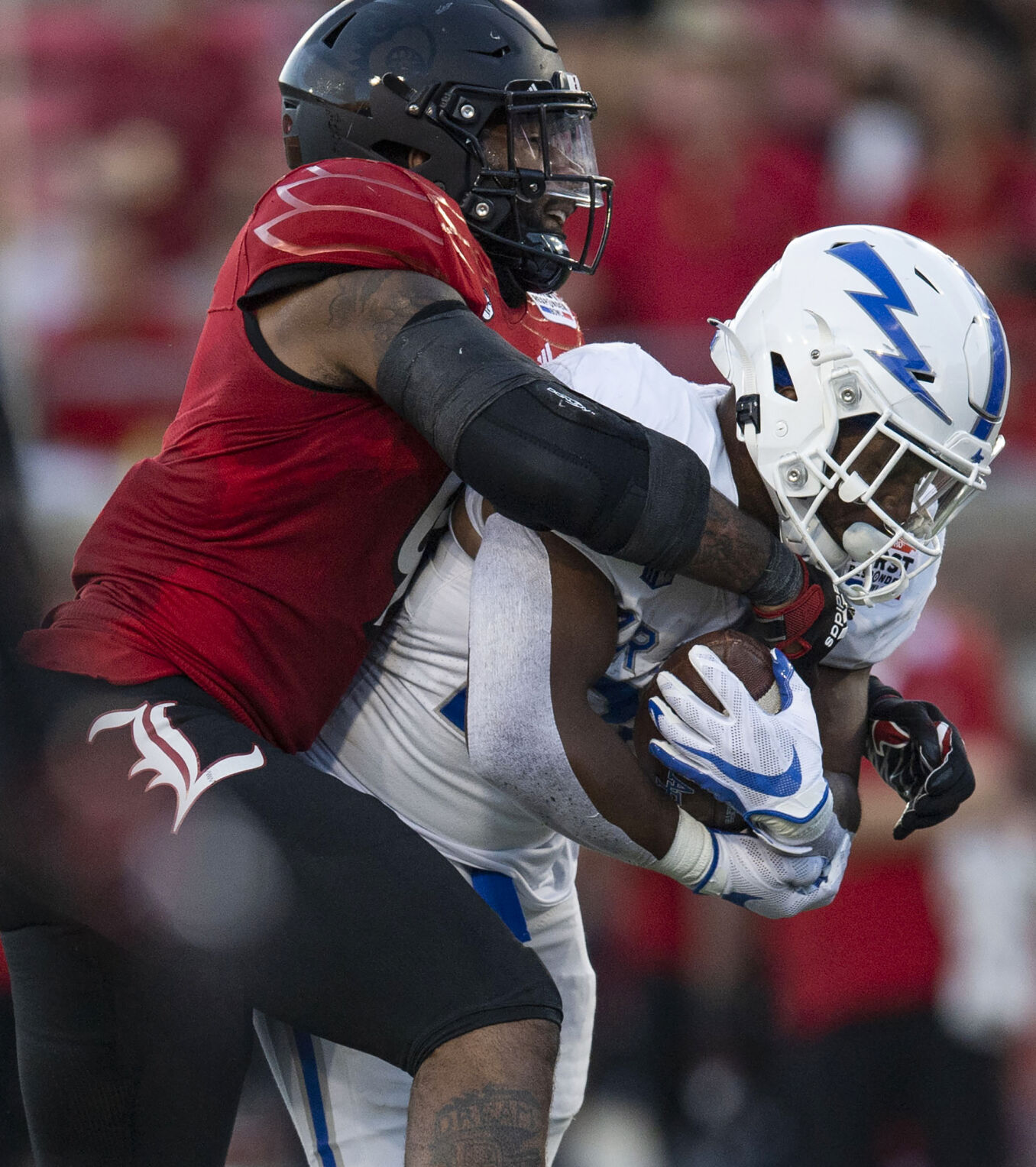 The Air Force Falcons take on the Louisville Cardinals during the 2021 First Responder Bowl at Gerald J. Ford Stadium on the campus of Southern Methodist University in Dallas, Texas on Tuesday, Dec. 28, 2021. The Falcons defeated the Cardinals and won the bowl game by a score of 31-28. (Chancey Bush/ The Gazette) (Chancey Bush/ The Gazette)