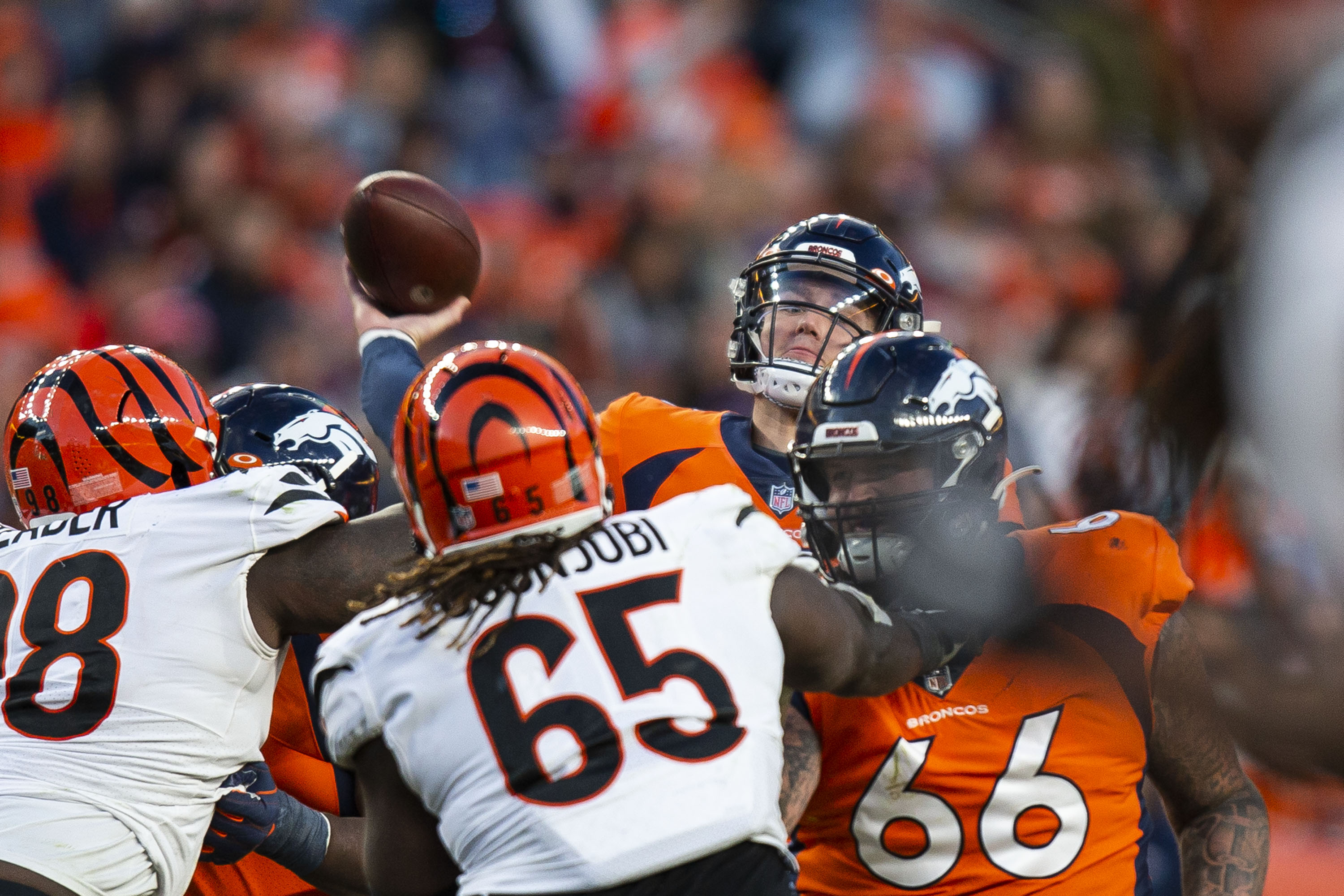 Denver Broncos quarterback Drew Lock (3) throws a touchdown pass to wide receiver Tim Patrick (81) during a game against the Cincinnati Bengals on Sunday, Dec. 19, 2021, at Empower Field at Mile High in Denver, Colo. (Timothy Hurst/The Gazette) (TimHursttim.hurst@gazette.comhttps://secure.gravatar.com/avatar/aca82bd62b4ee425c598527cd6faa1b1?d=mm&r=g)