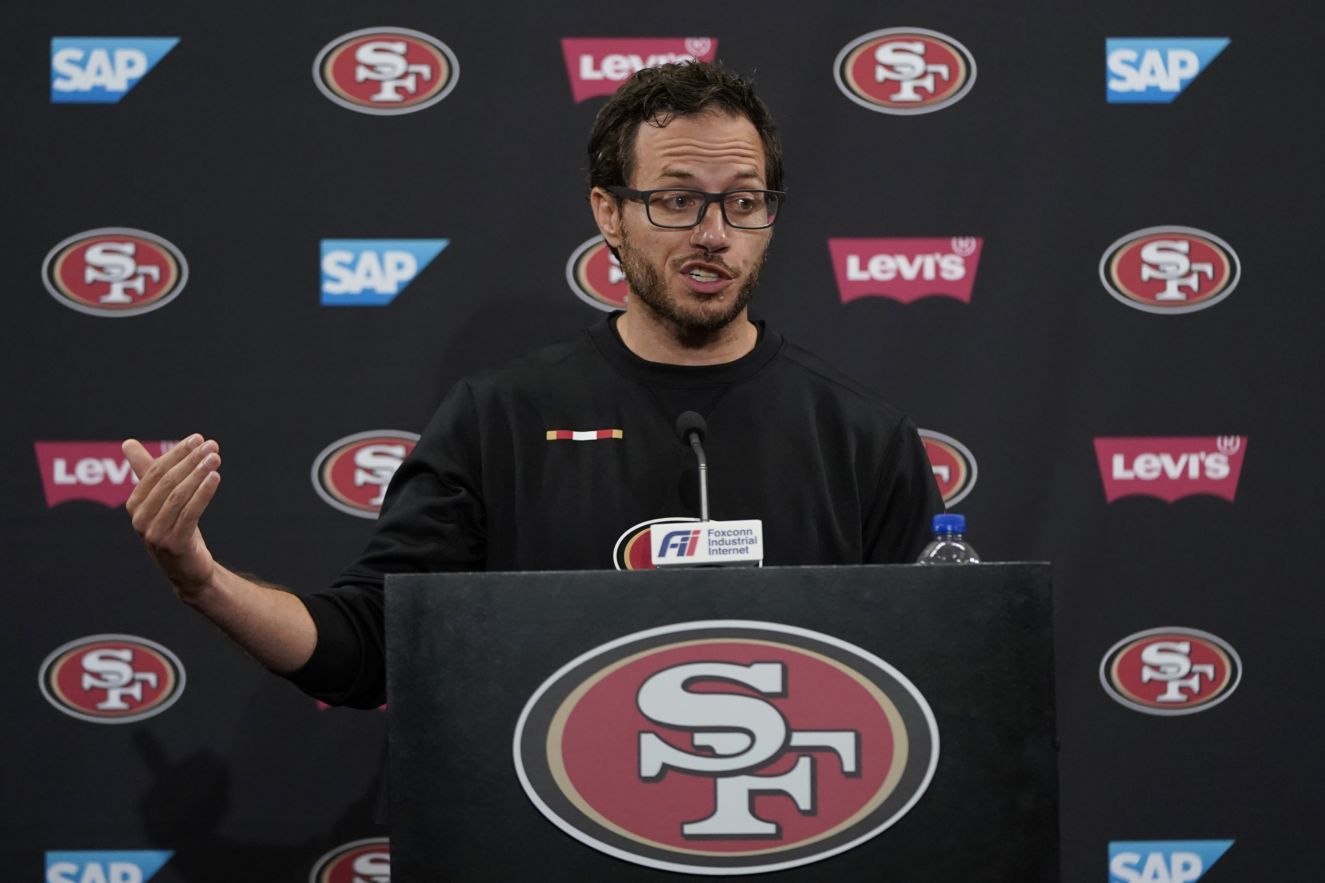 San Francisco 49ers offensive coordinator Mike McDaniel speaks during a news conference in July in Santa Clara, Calif. (the associated press)