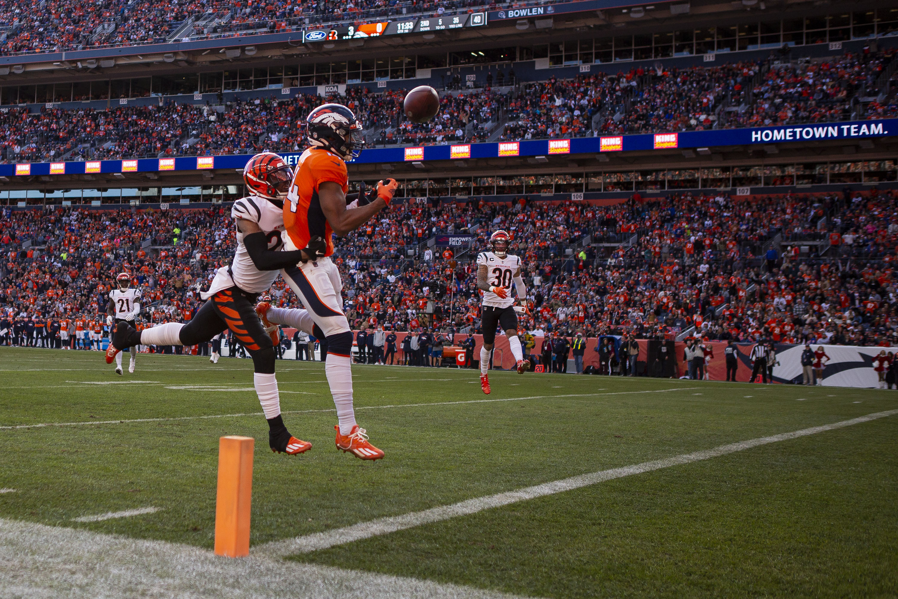 Denver Broncos wide receiver Courtland Sutton (14) can’t reel in a pass from quarterback Teddy Bridgewater (5) while being defended by Cincinnati Bengals cornerback Eli Apple (20) on Sunday, Dec. 19, 2021, at Empower Field at Mile High in Denver, Colo. (Timothy Hurst/The Gazette) (TimHursttim.hurst@gazette.comhttps://secure.gravatar.com/avatar/aca82bd62b4ee425c598527cd6faa1b1?d=mm&r=g)