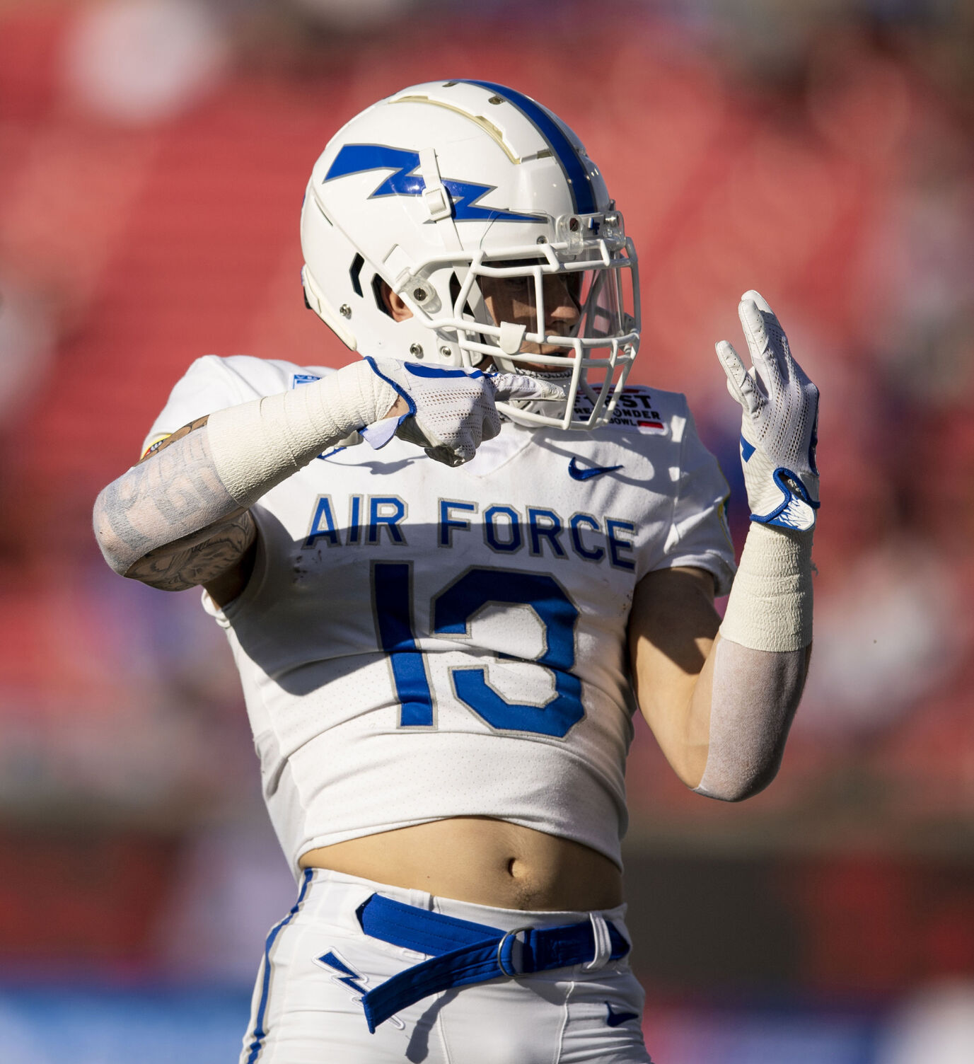 Air Force senior wide receiver Brandon Lewis (13) reacts after another touchdown as the Air Force Falcons take on the Louisville Cardinals during the 2021 First Responder Bowl at Gerald J. Ford Stadium on the campus of Southern Methodist University in Dallas, Texas on Tuesday, Dec. 28, 2021. The Falcons defeated the Cardinals and won the bowl game by a score of 31-28. (Chancey Bush/ The Gazette) (Chancey Bush/ The Gazette)
