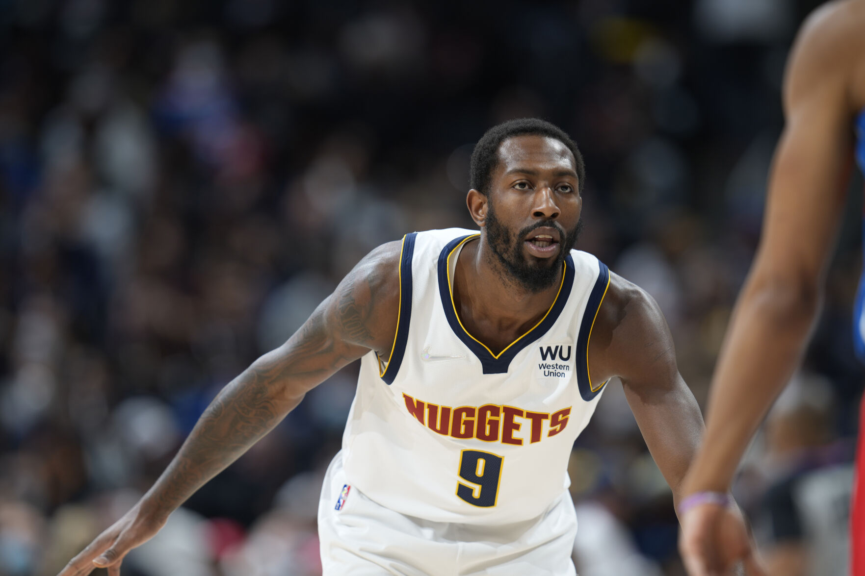 Nuggets coach Michael Malone acknowledges his desire to keep Davon Reed in Denver