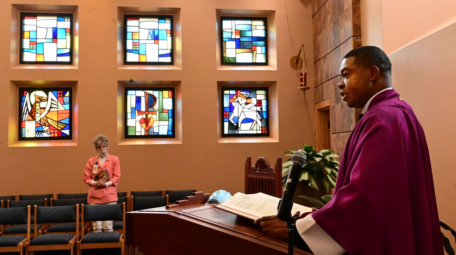 Rev. Stephen Akujobi holds a noon mass in the chapel at Penrose Hospital on Monday, Dec. 6, 2021. (Photo by Jerilee Bennett, The Gazette) (Jerilee Bennett)