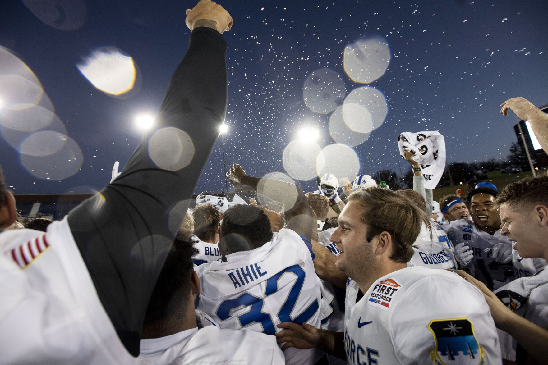 Air Force Falcons celebrate their victory over the Louisville Cardinals during the 2021 First Responder Bowl at Gerald J. Ford Stadium on the campus of Southern Methodist University in Dallas, Texas on Tuesday, Dec. 28, 2021. The Falcons defeated the Cardinals and won the bowl game by a score of 31-28. (Chancey Bush/ The Gazette) (Chancey Bush/ The Gazette)