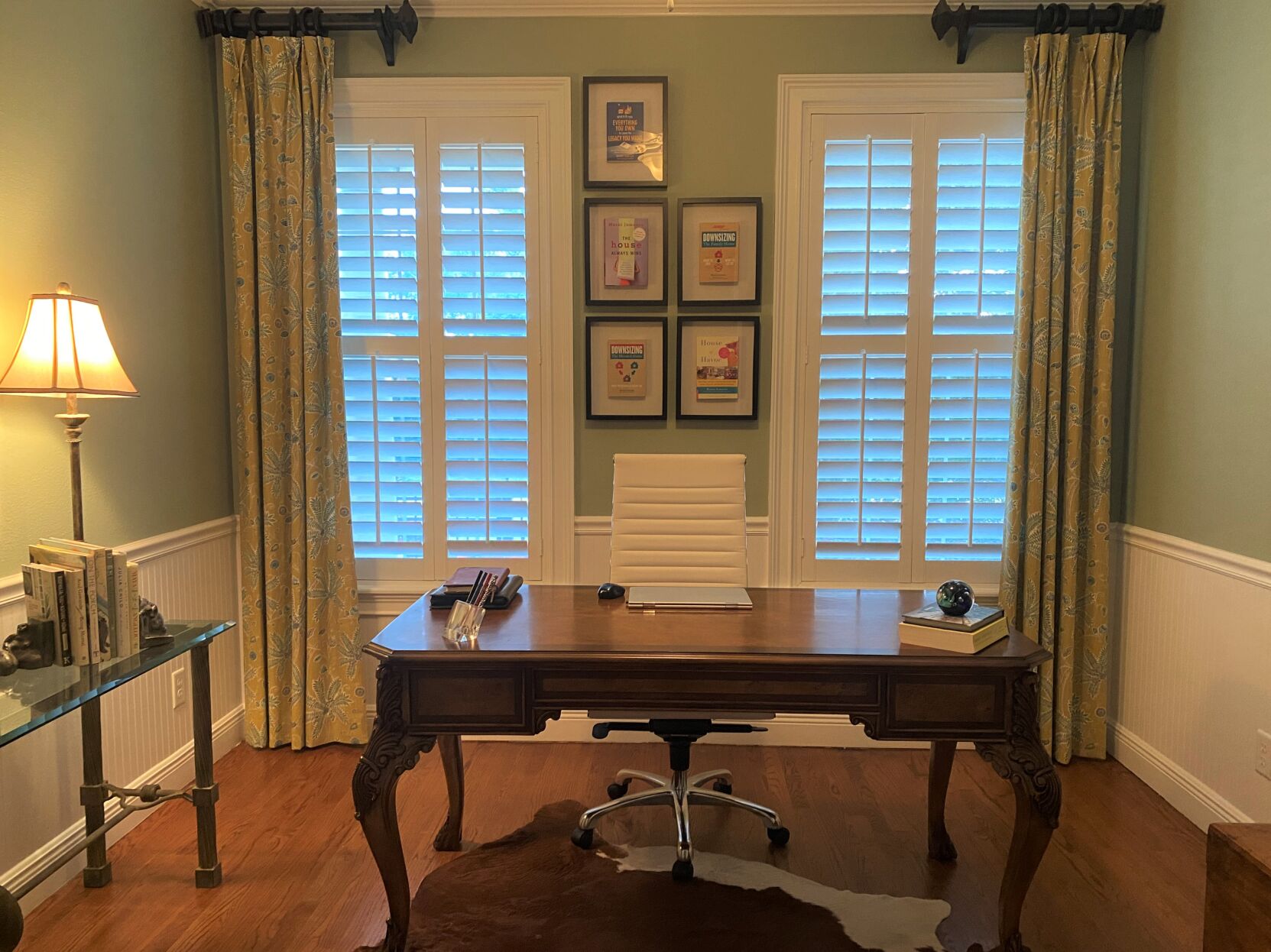 Small moves, such as trading out this traditional brown leather office chair for a m ore modern white and chrome one, can instantly refresh and update a space. But you have to be ready to let go. Photo by Marni Jameson (Marni Jameson)